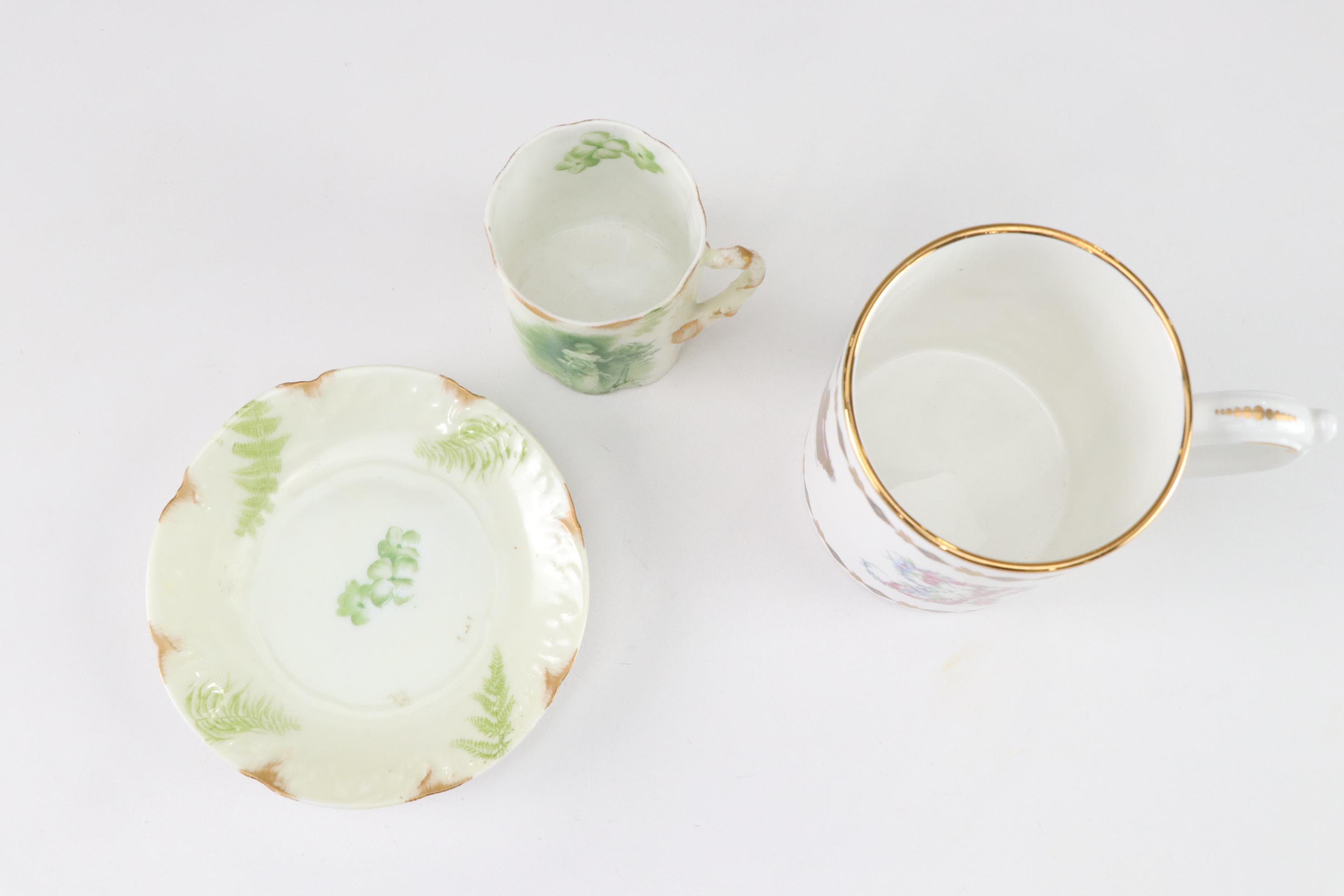 Assorted Porcelain Cups and Saucers with George III's Mug