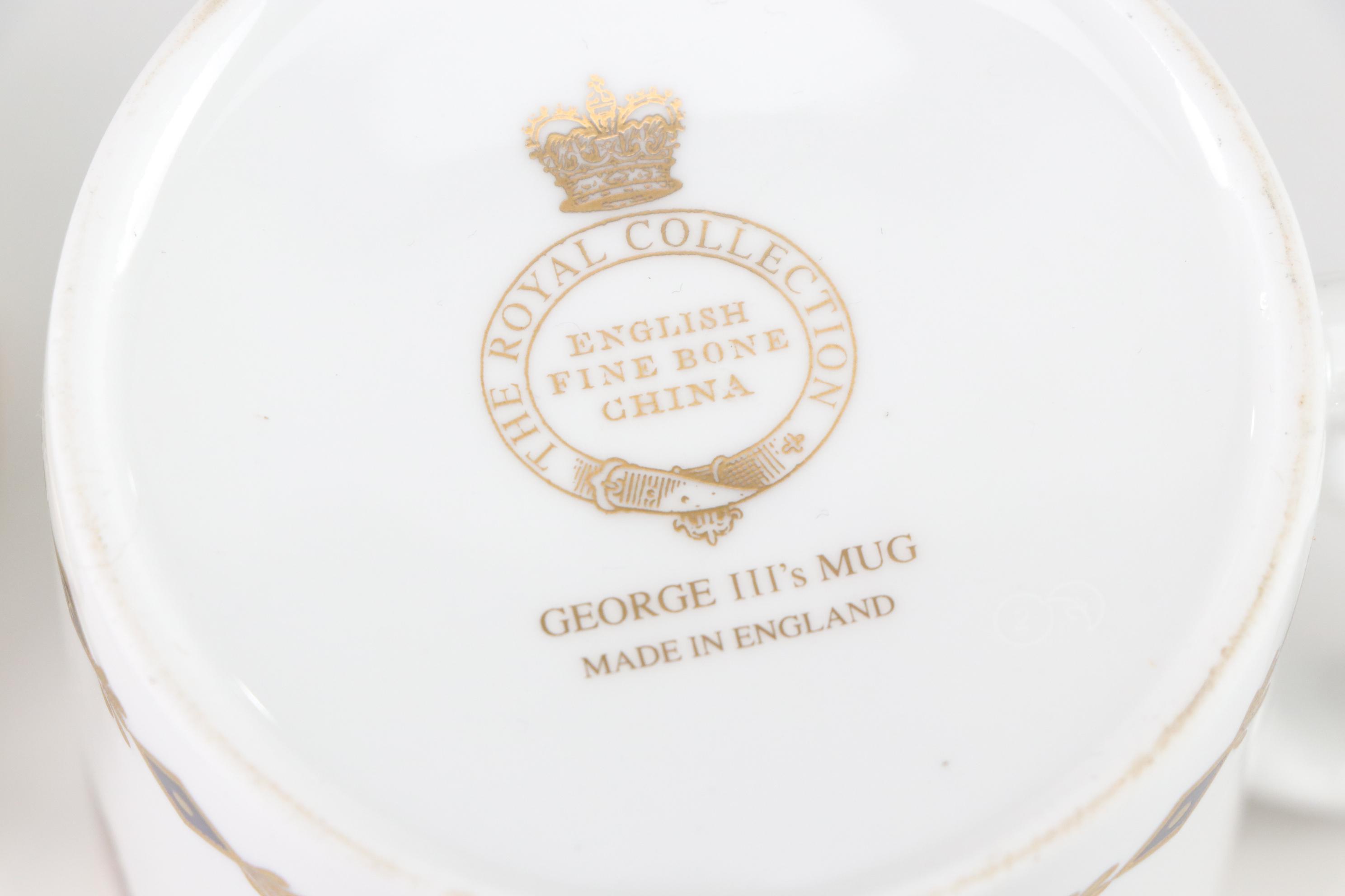 Assorted Porcelain Cups and Saucers with George III's Mug