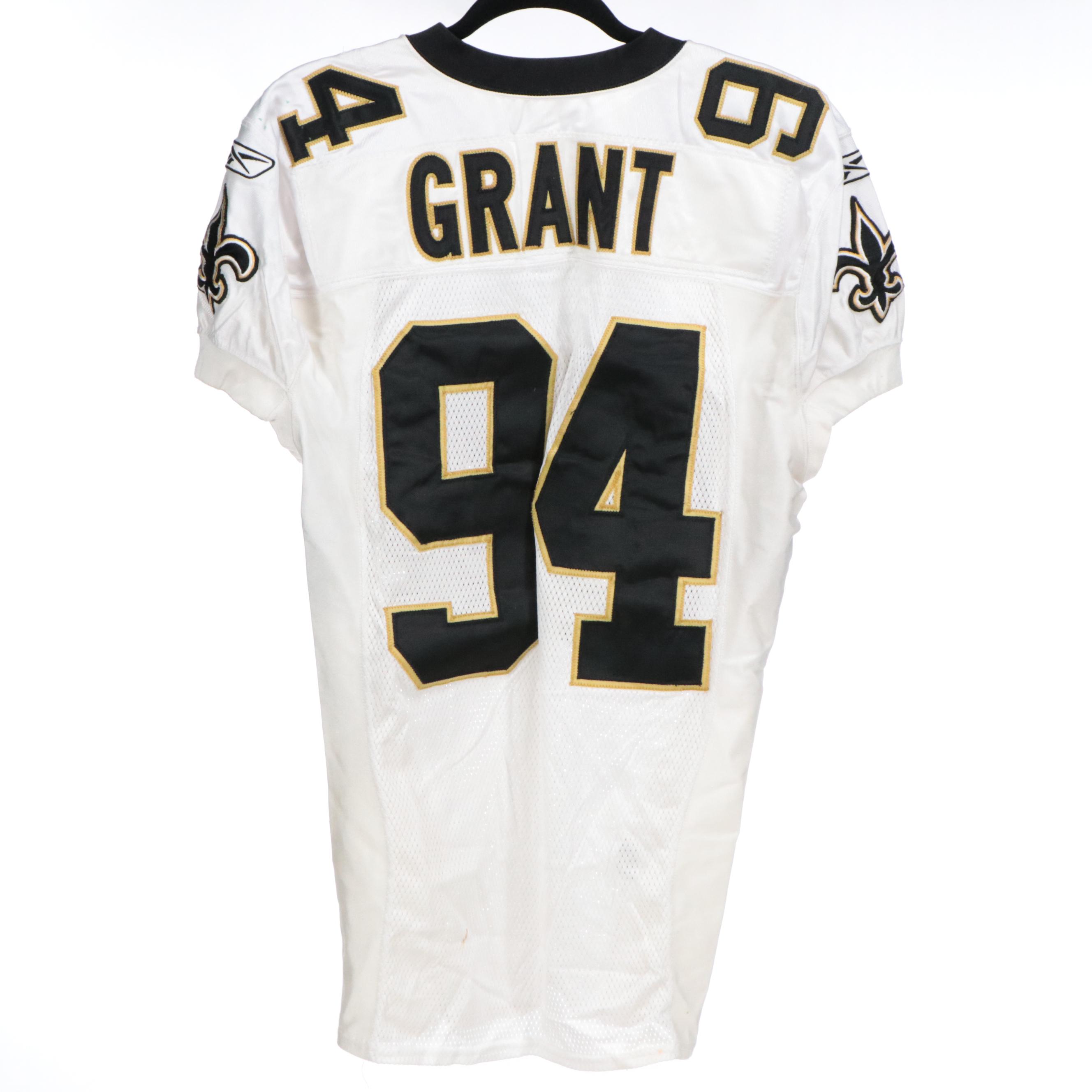 Charles Grant Game Used New Orleans Saints Jersey and Signed Football