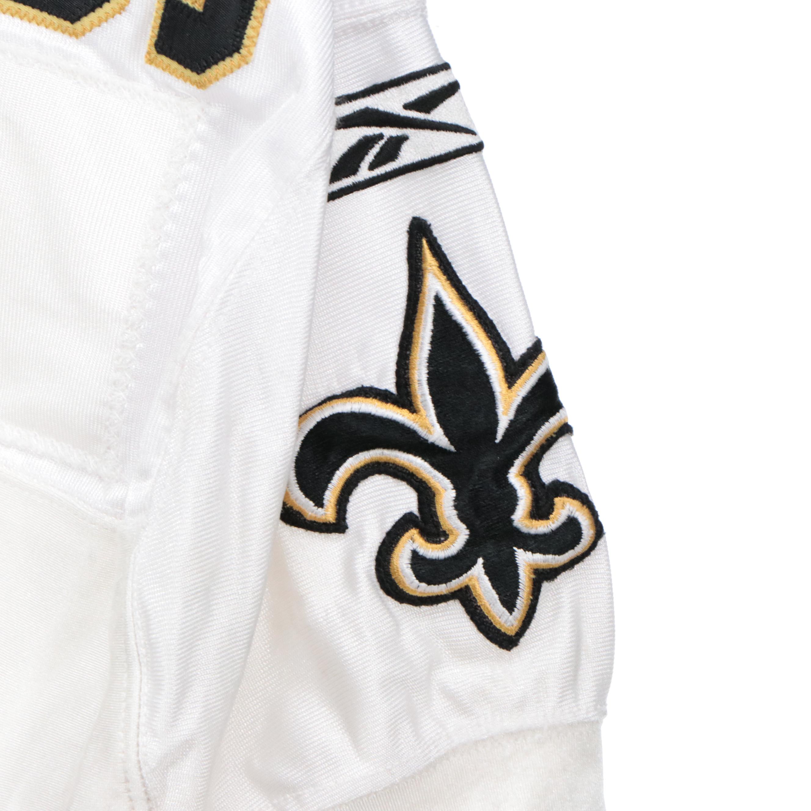 Charles Grant Game Used New Orleans Saints Jersey and Signed Football