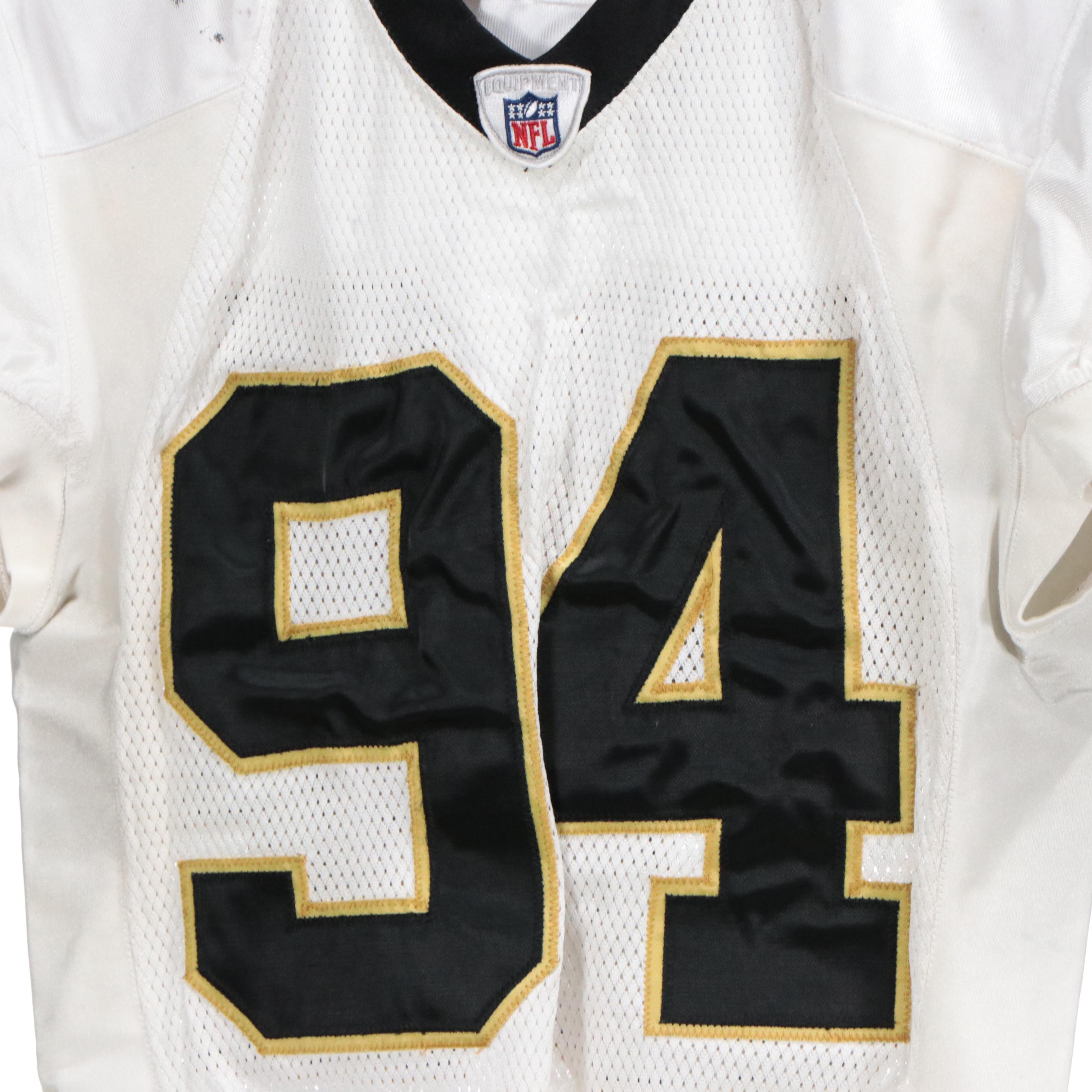 Charles Grant Game Used New Orleans Saints Jersey and Signed Football