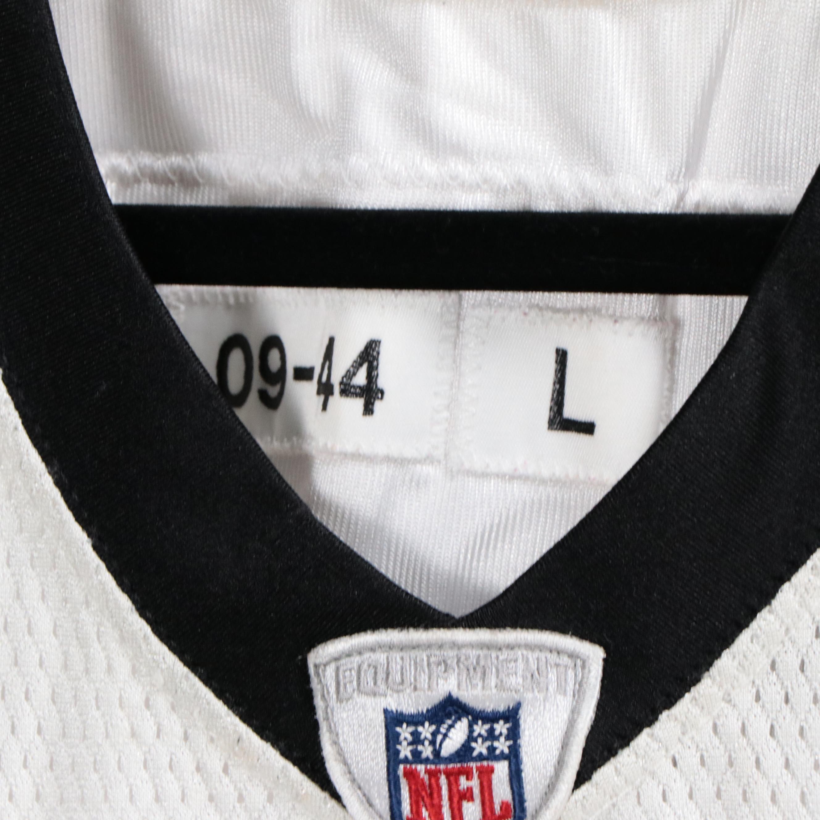 Charles Grant Game Used New Orleans Saints Jersey and Signed Football