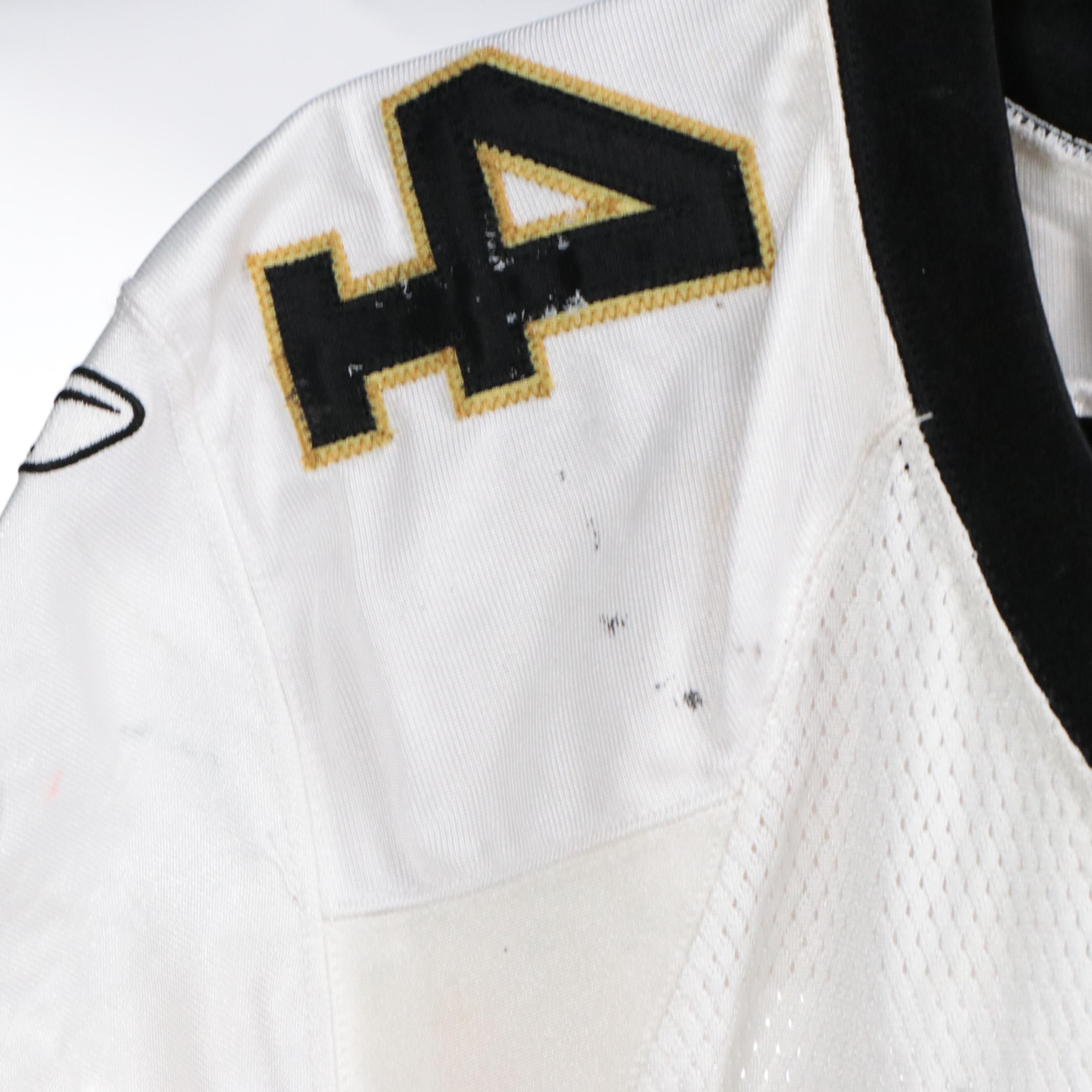 Charles Grant Game Used New Orleans Saints Jersey and Signed Football