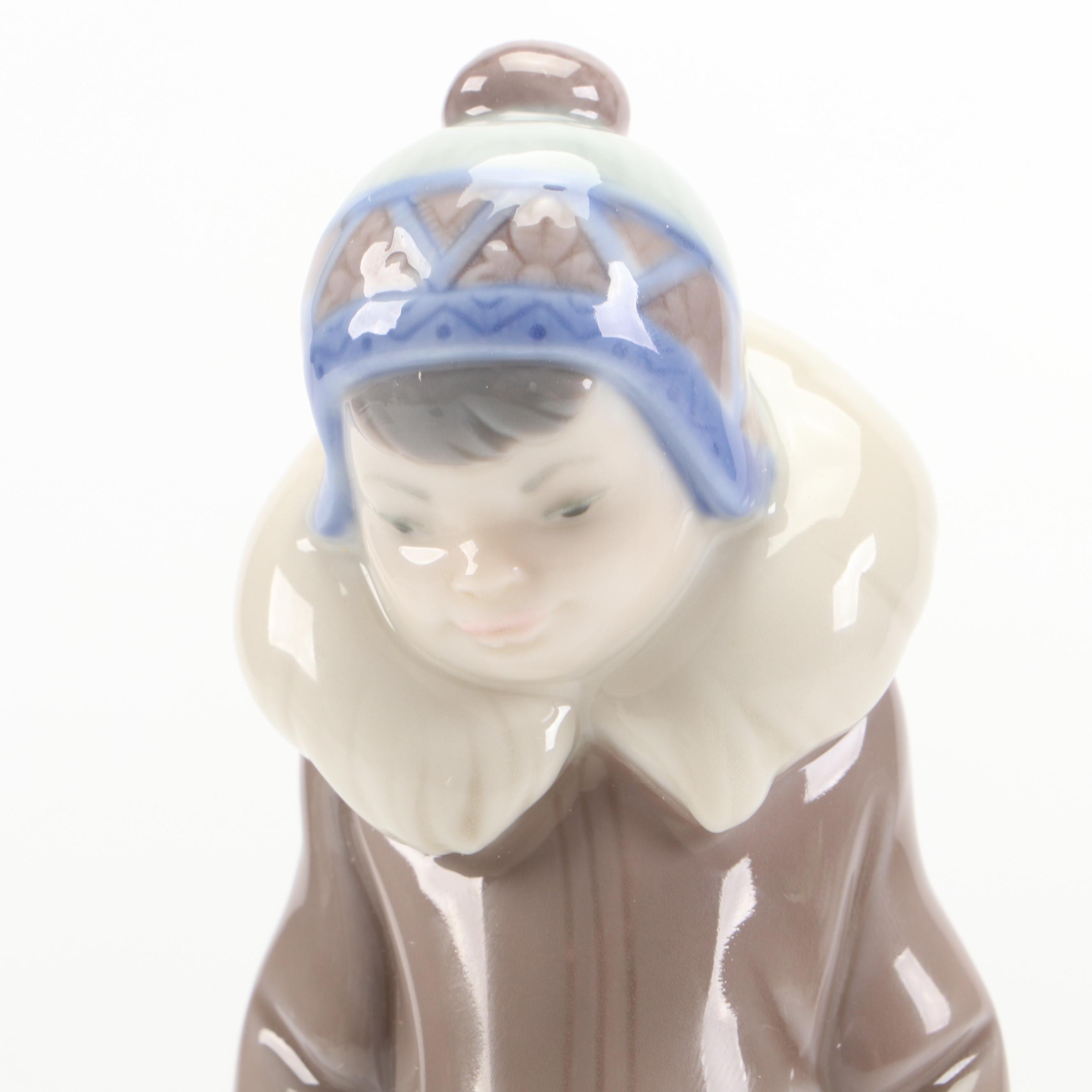 Lladró "Eskimo Boy with Pet" Porcelain Figurine