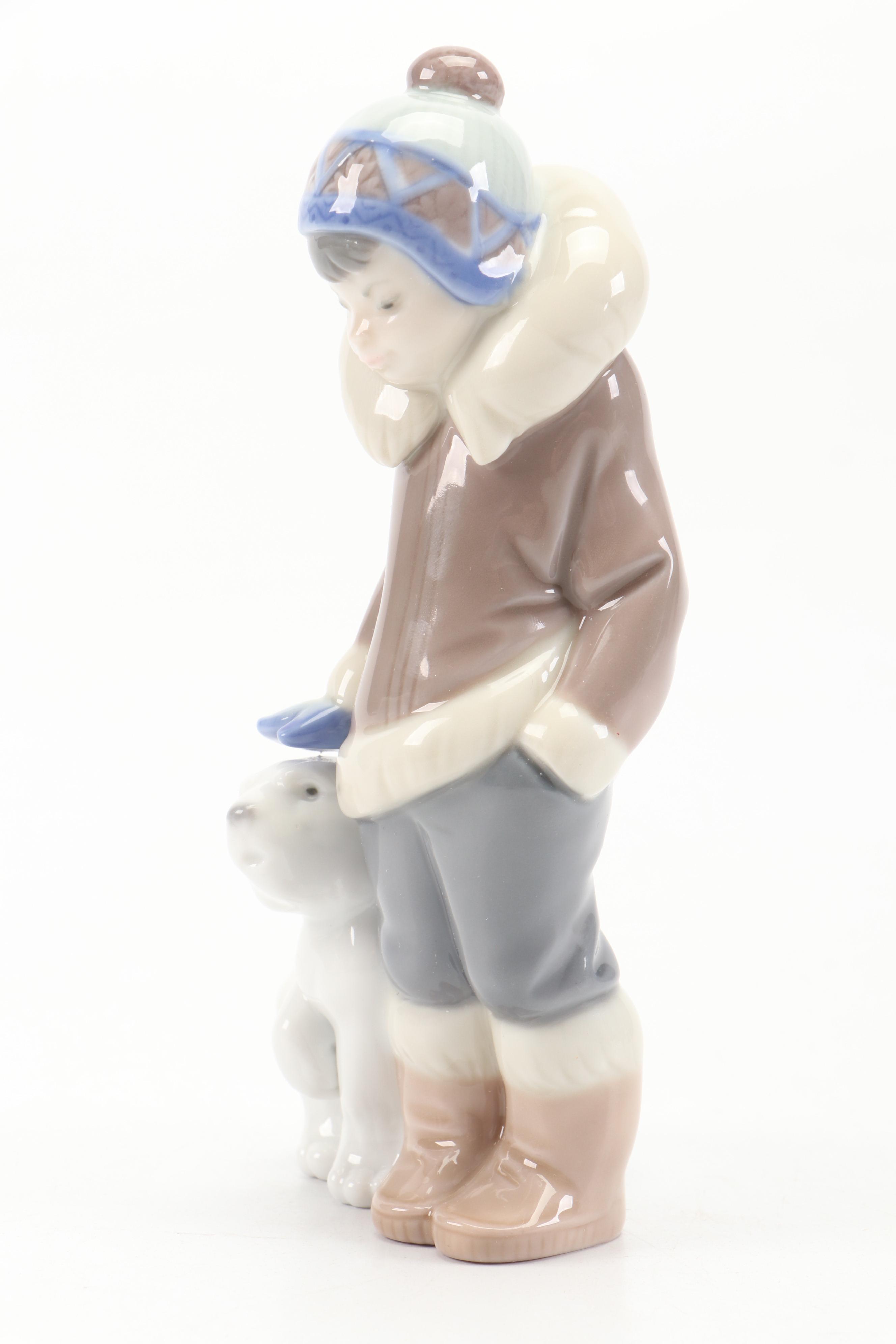 Lladró "Eskimo Boy with Pet" Porcelain Figurine