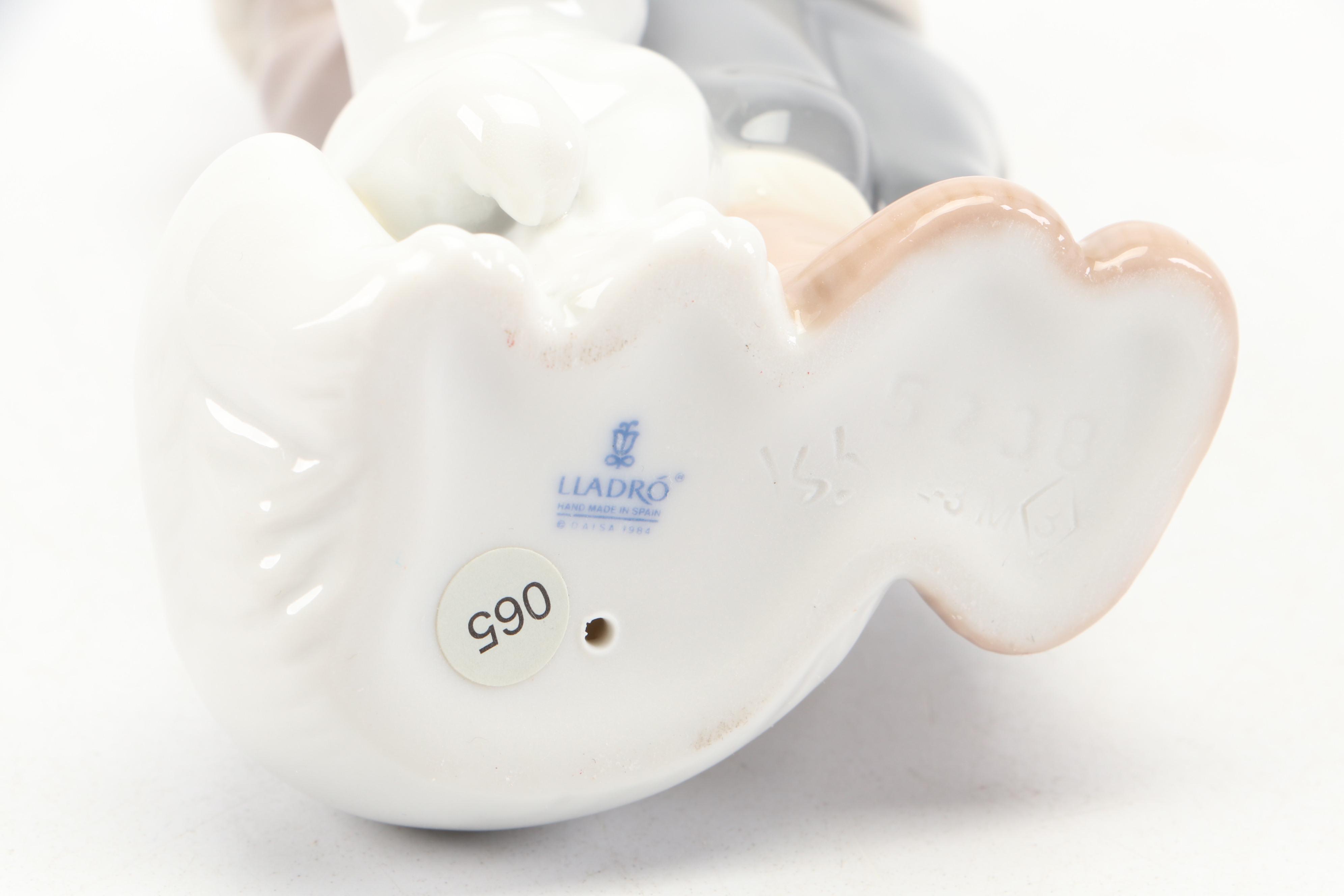 Lladró "Eskimo Boy with Pet" Porcelain Figurine