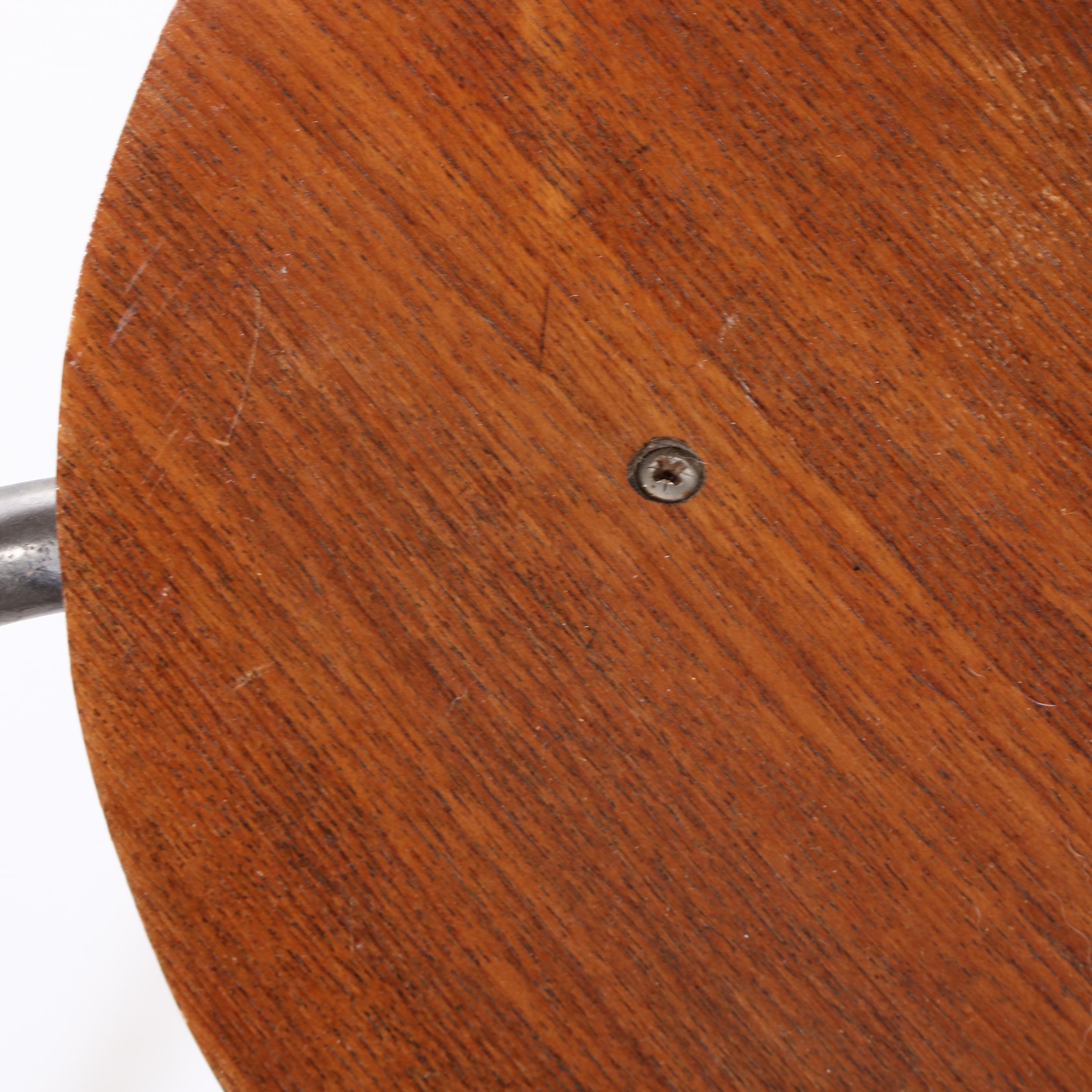 Arne Jacobsen for Fritz Hansen of Denmark "Dot" Walnut and Steel Stool
