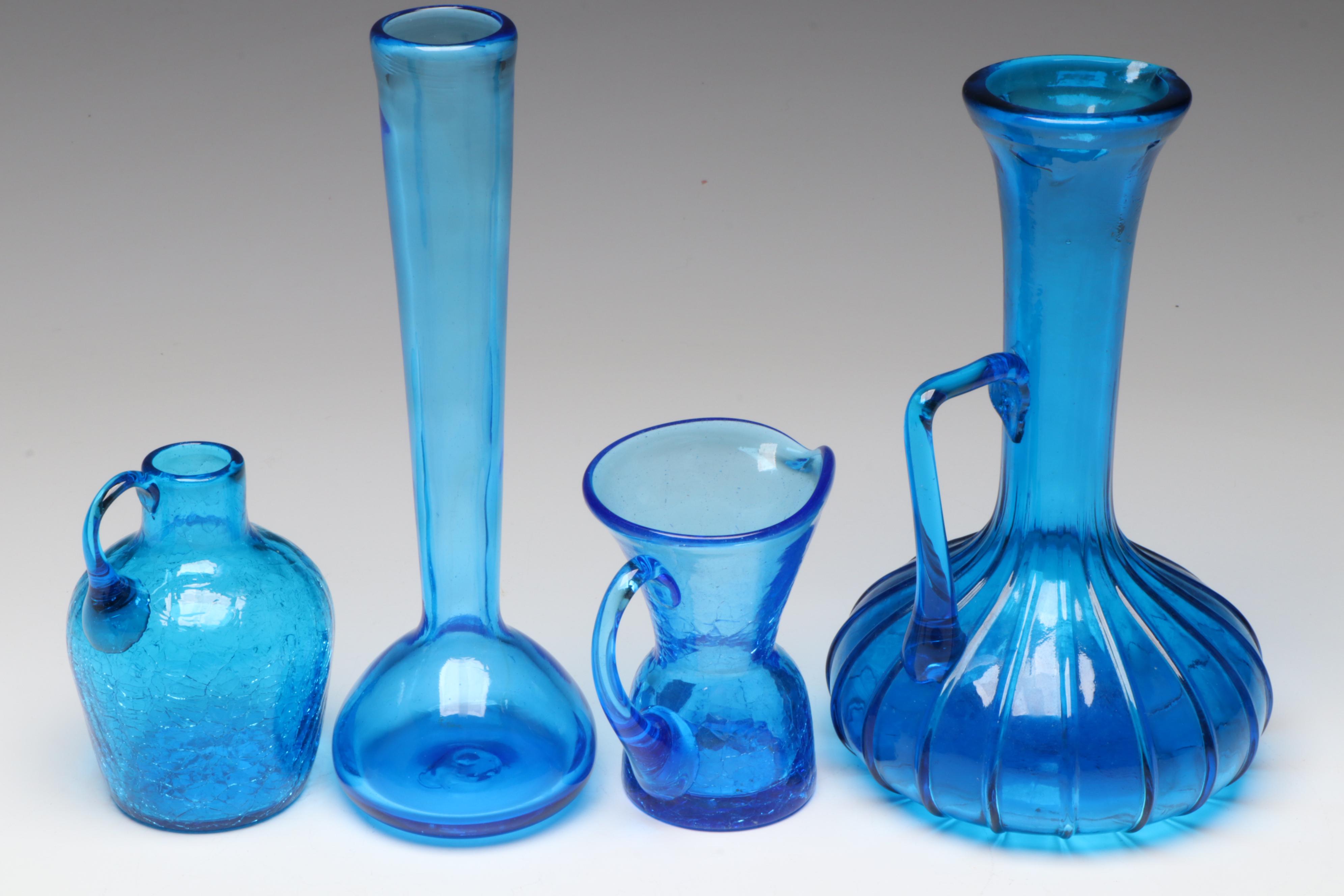 Rainbow Blown Glass Pitcher with Other Blue Crackle Glass Vases and Pitchers