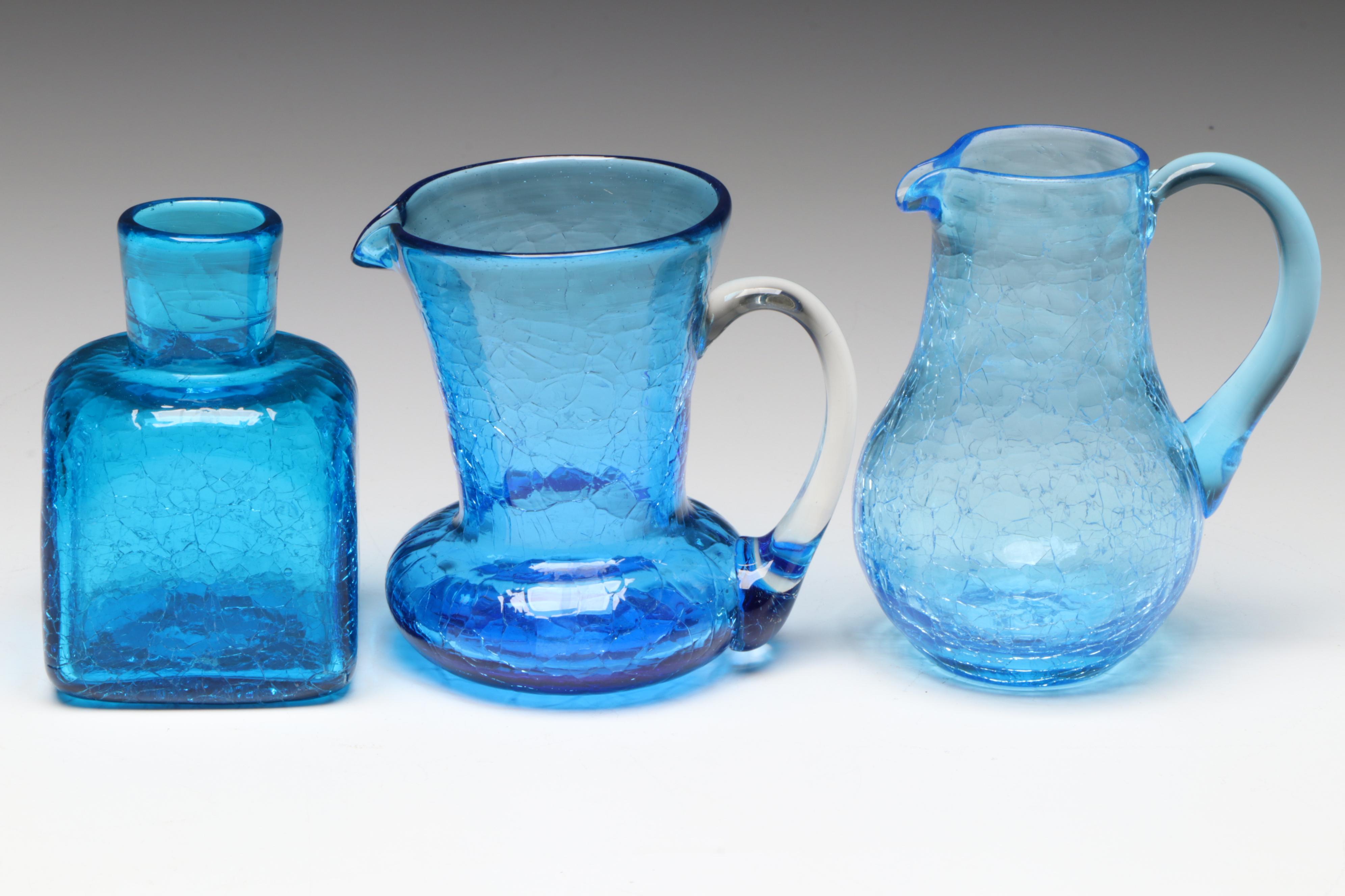 Rainbow Blown Glass Pitcher with Other Blue Crackle Glass Vases and Pitchers
