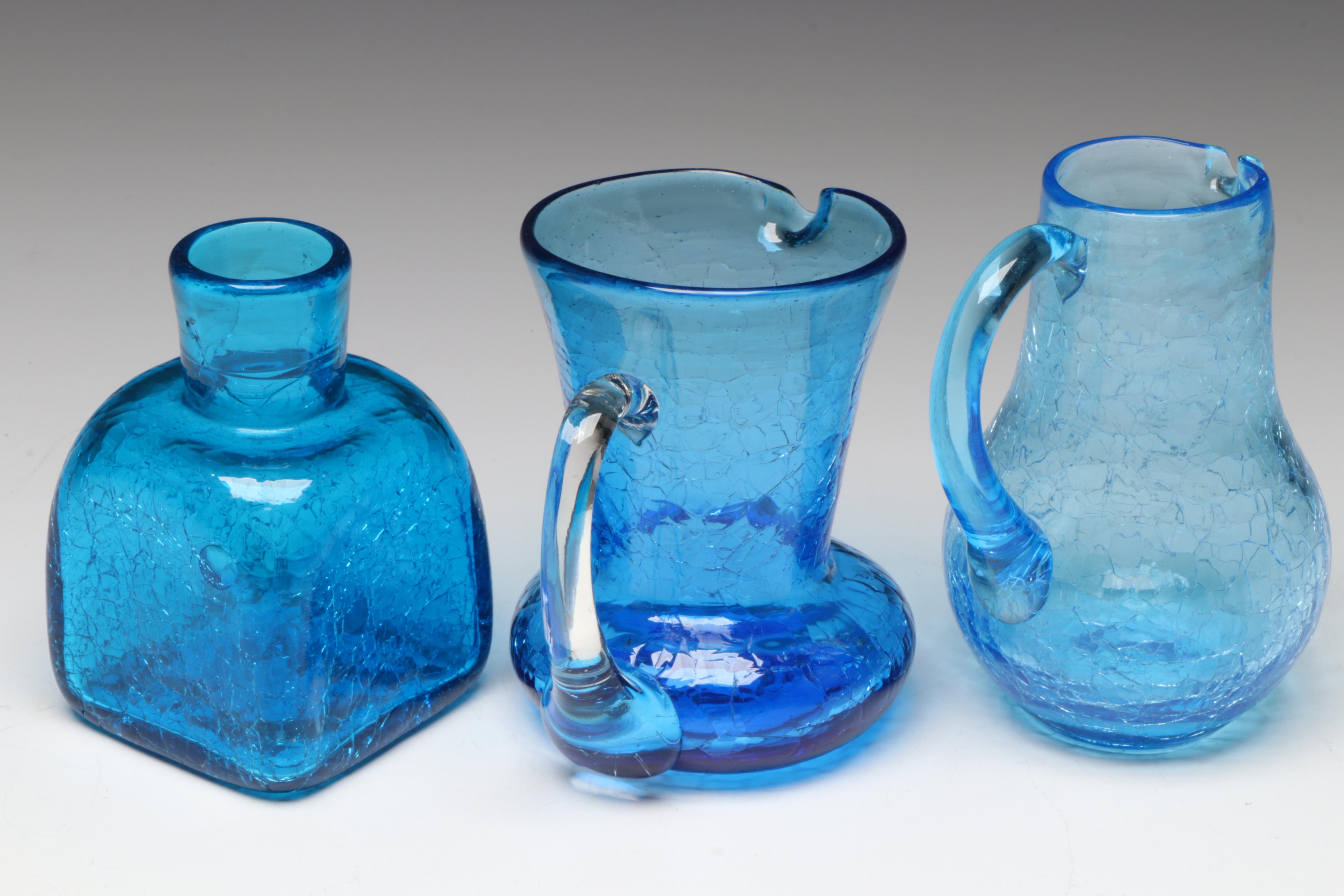 Rainbow Blown Glass Pitcher with Other Blue Crackle Glass Vases and Pitchers