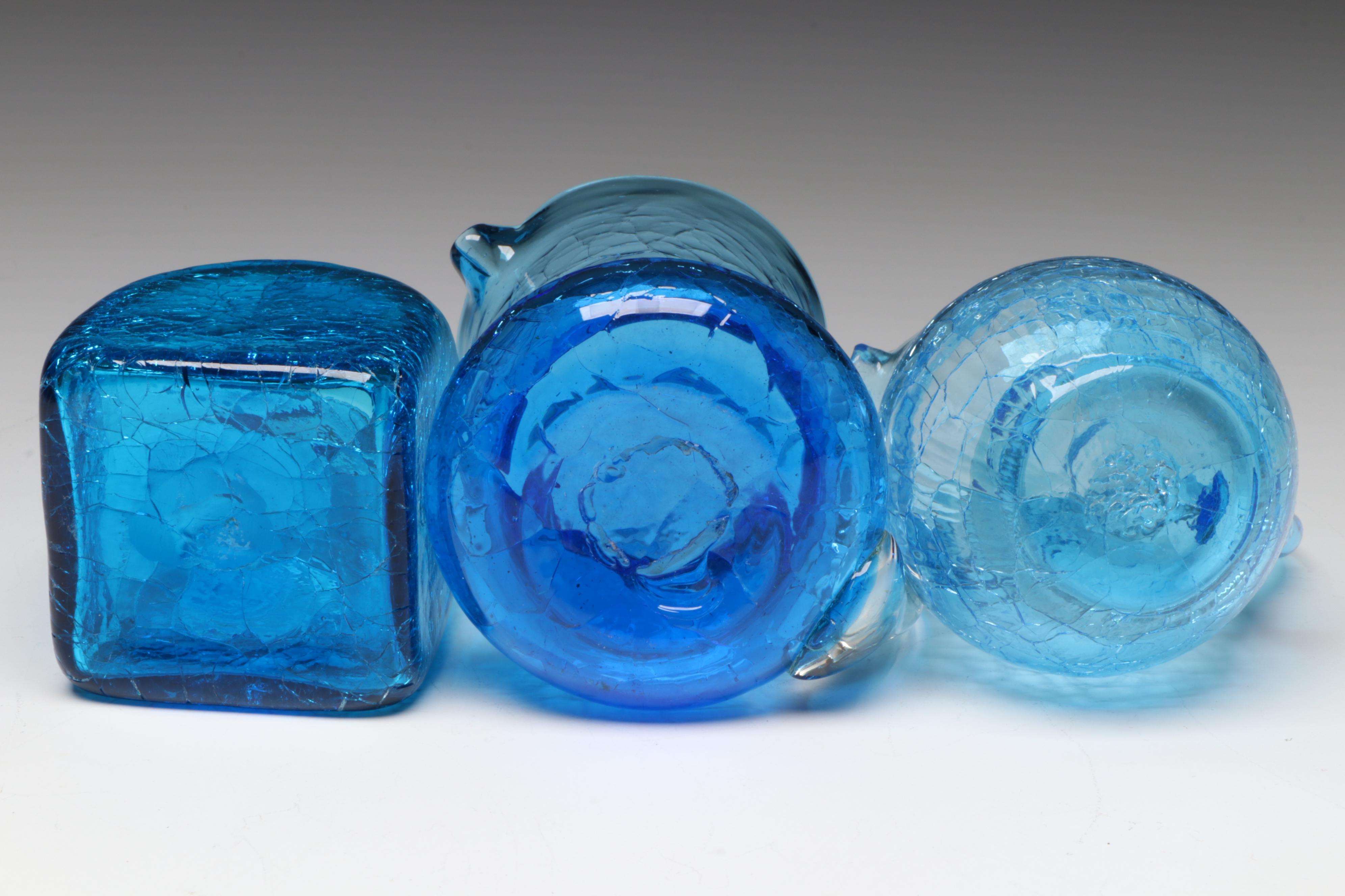 Rainbow Blown Glass Pitcher with Other Blue Crackle Glass Vases and Pitchers