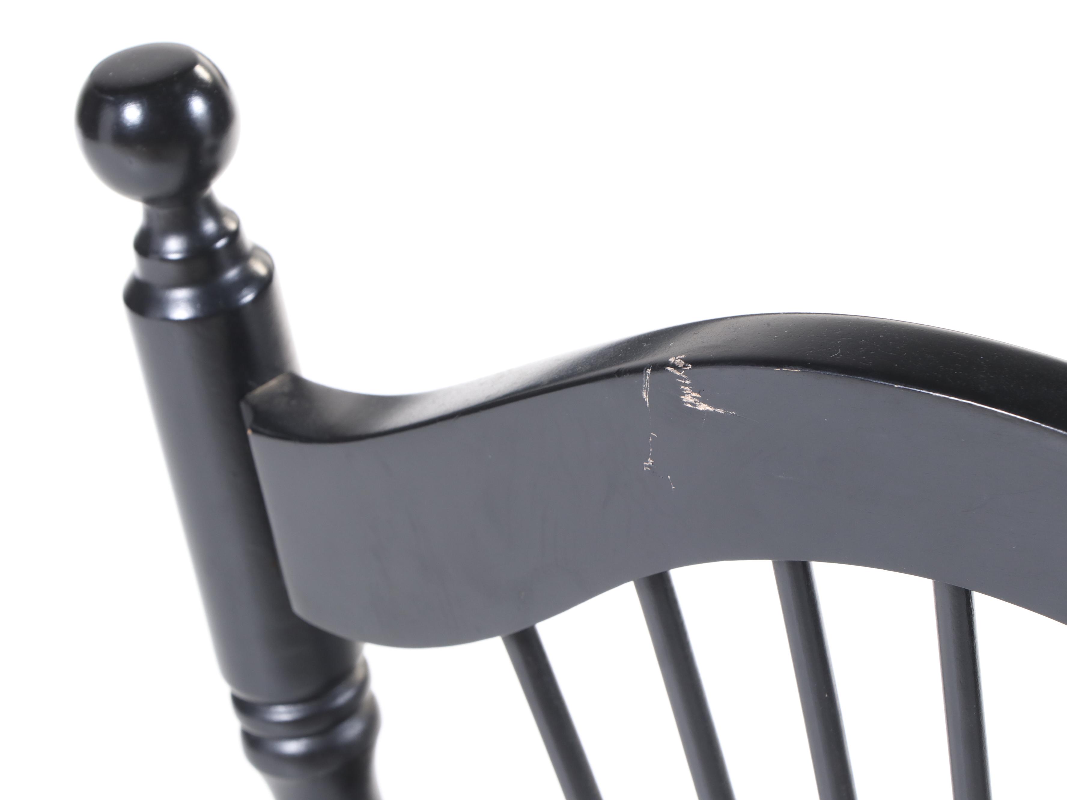 Four Colonial Style Ebonized Swivel Counter Stools