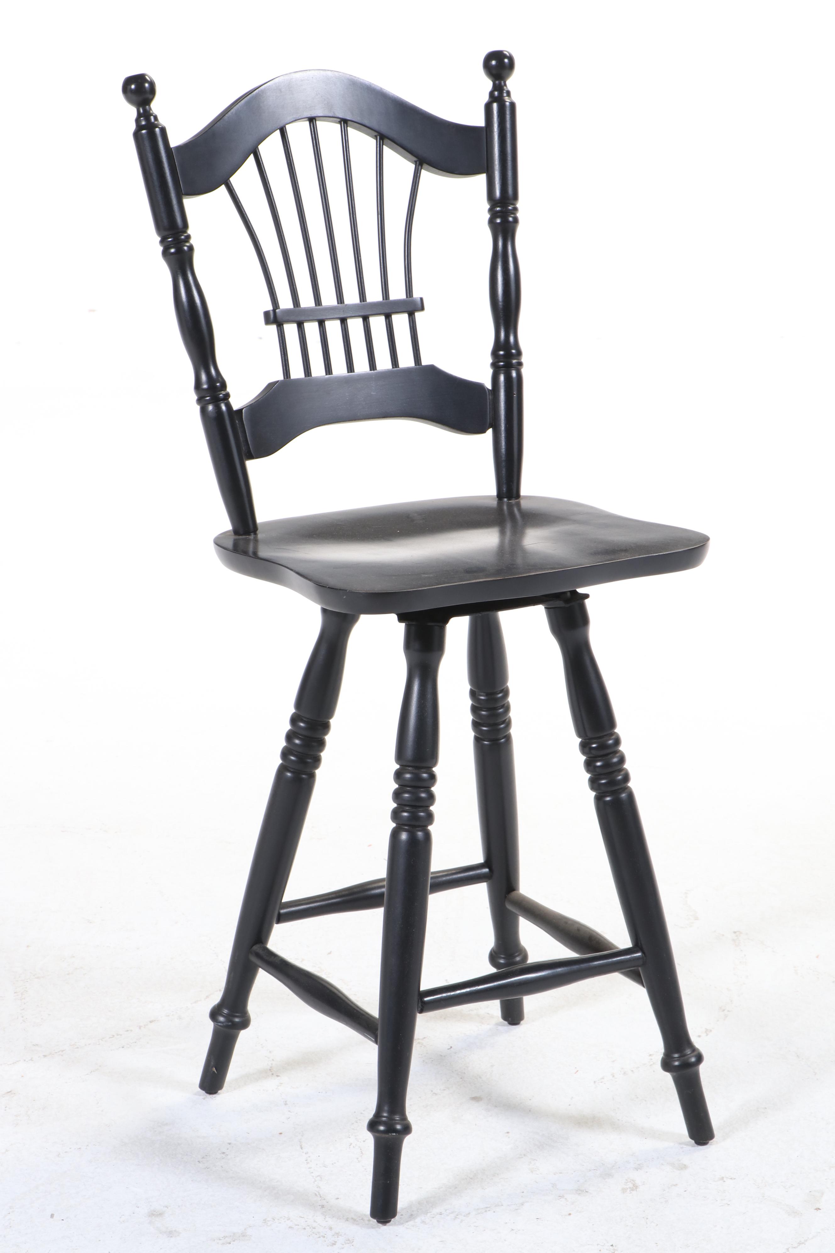 Four Colonial Style Ebonized Swivel Counter Stools