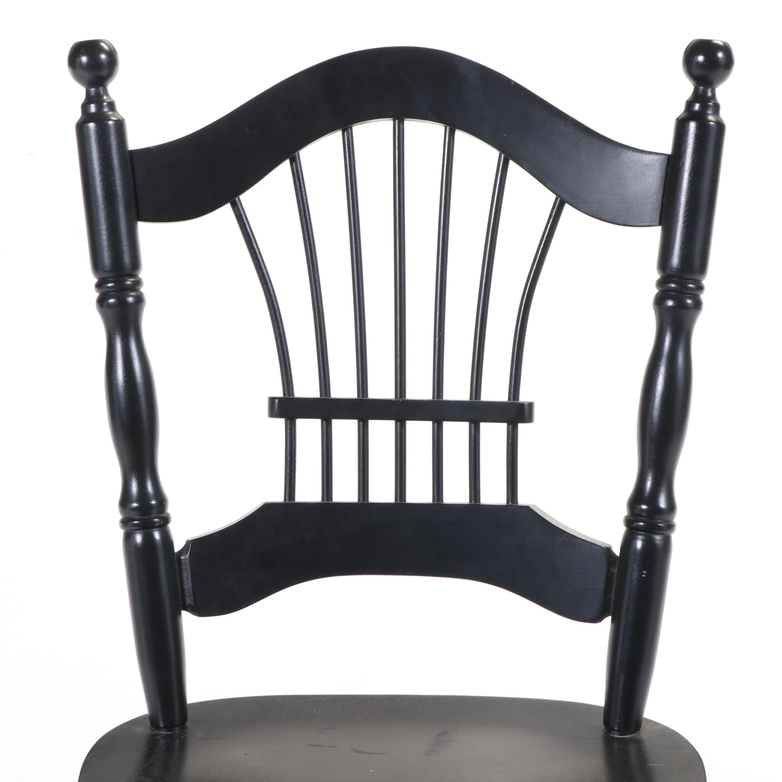 Four Colonial Style Ebonized Swivel Counter Stools