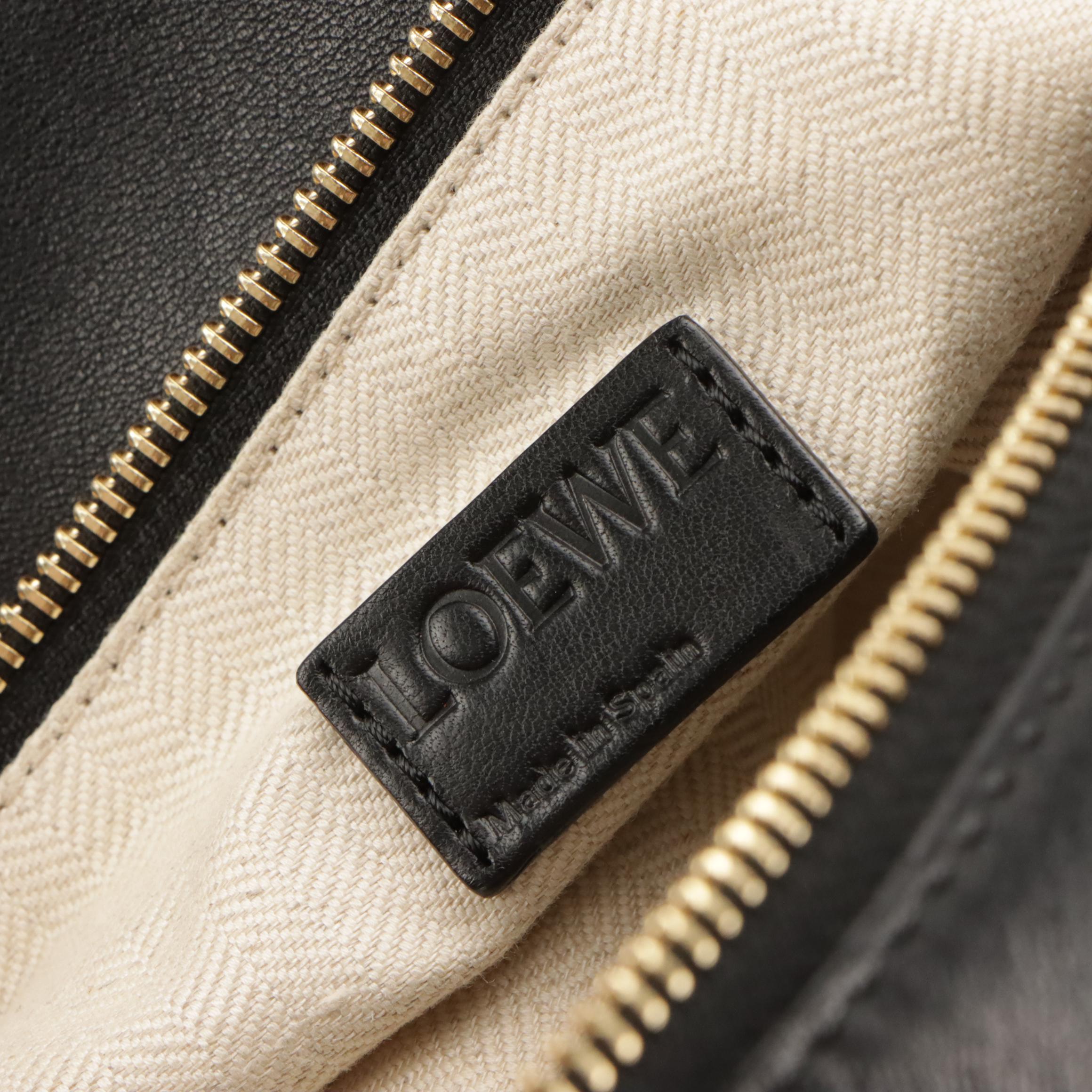 Loewe Puzzle Handbag in Dark Green Suede and Black Leather Trim
