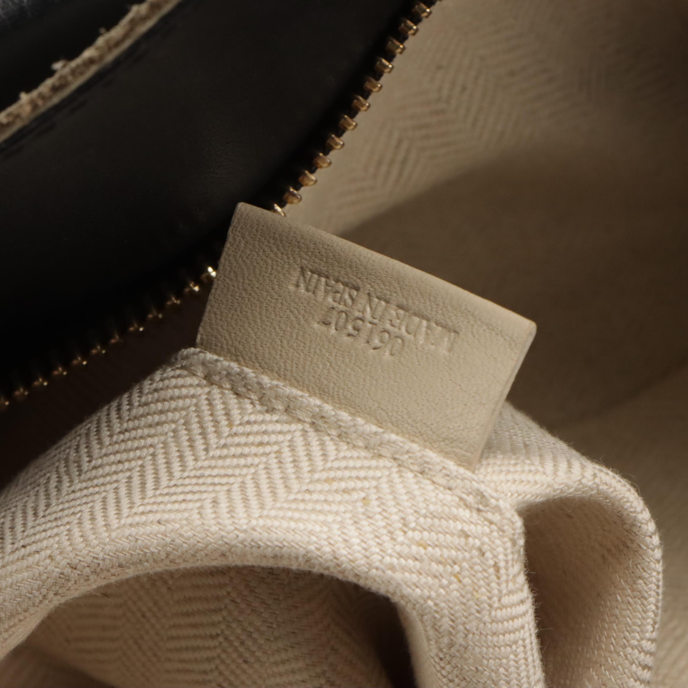 Loewe Puzzle Handbag in Dark Green Suede and Black Leather Trim