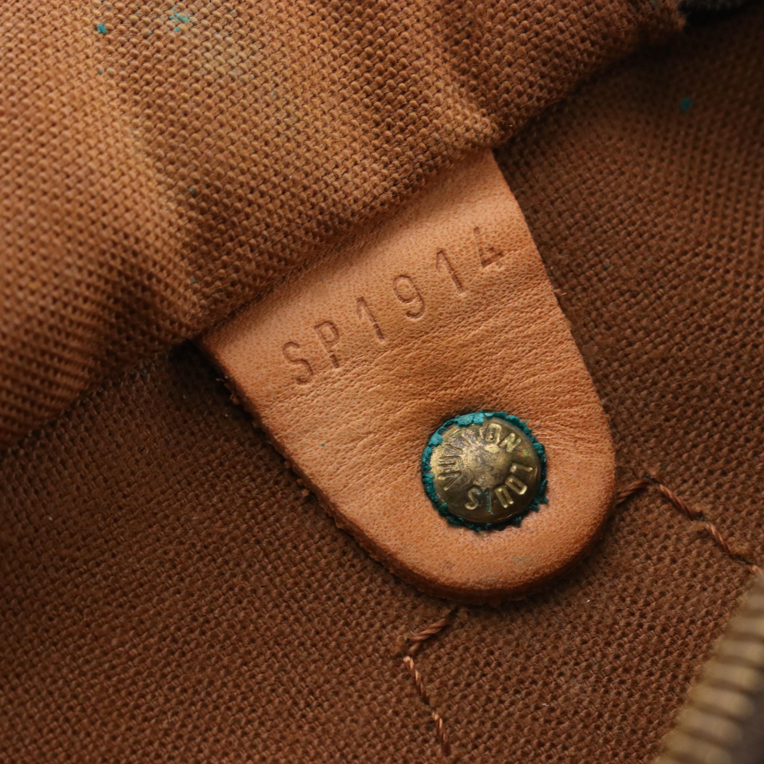 Louis Vuitton Speedy 30 Handbag in Monogram Canvas and Leather