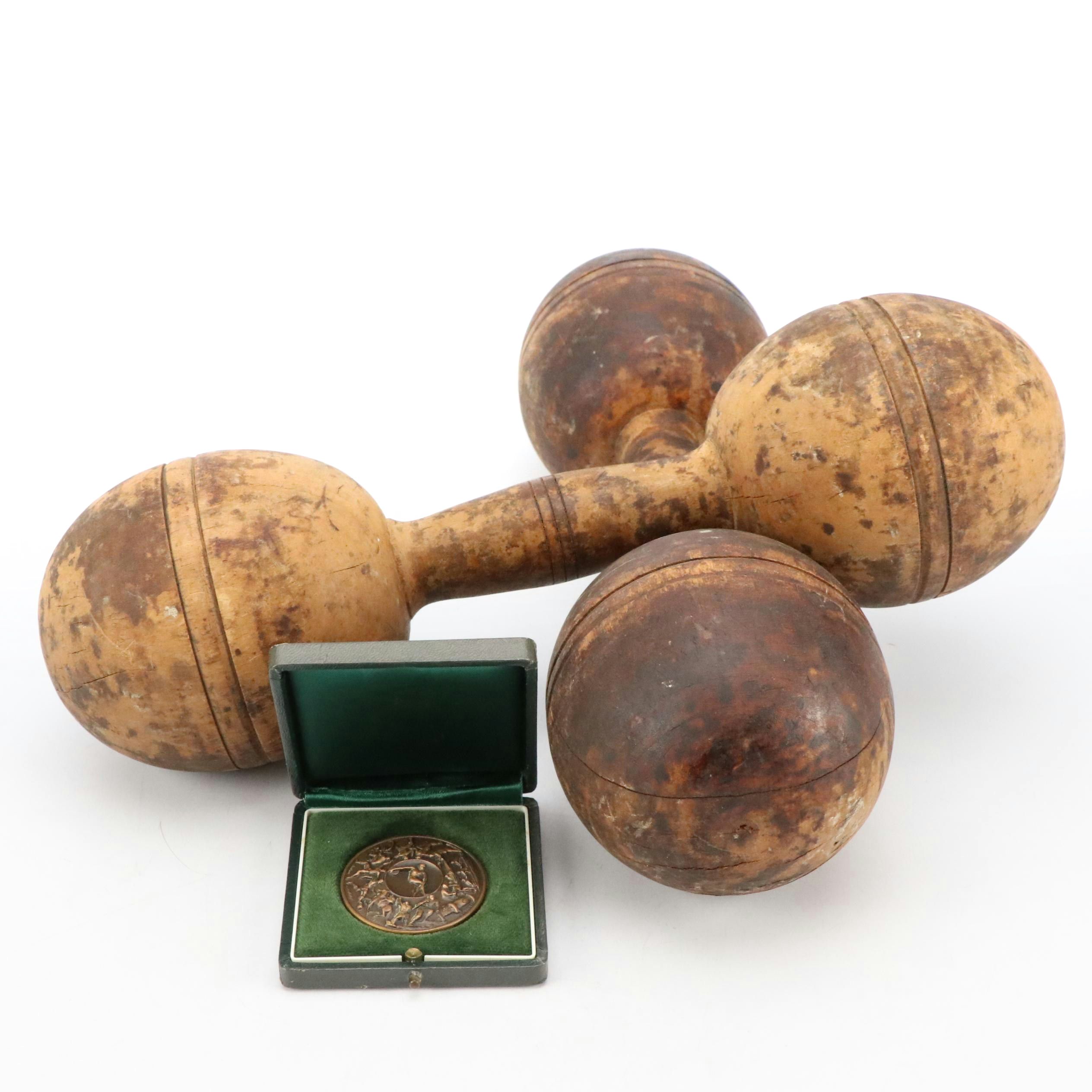 Turned Wooden Dumbells with Bronze Fitness Token, Early 20th Century