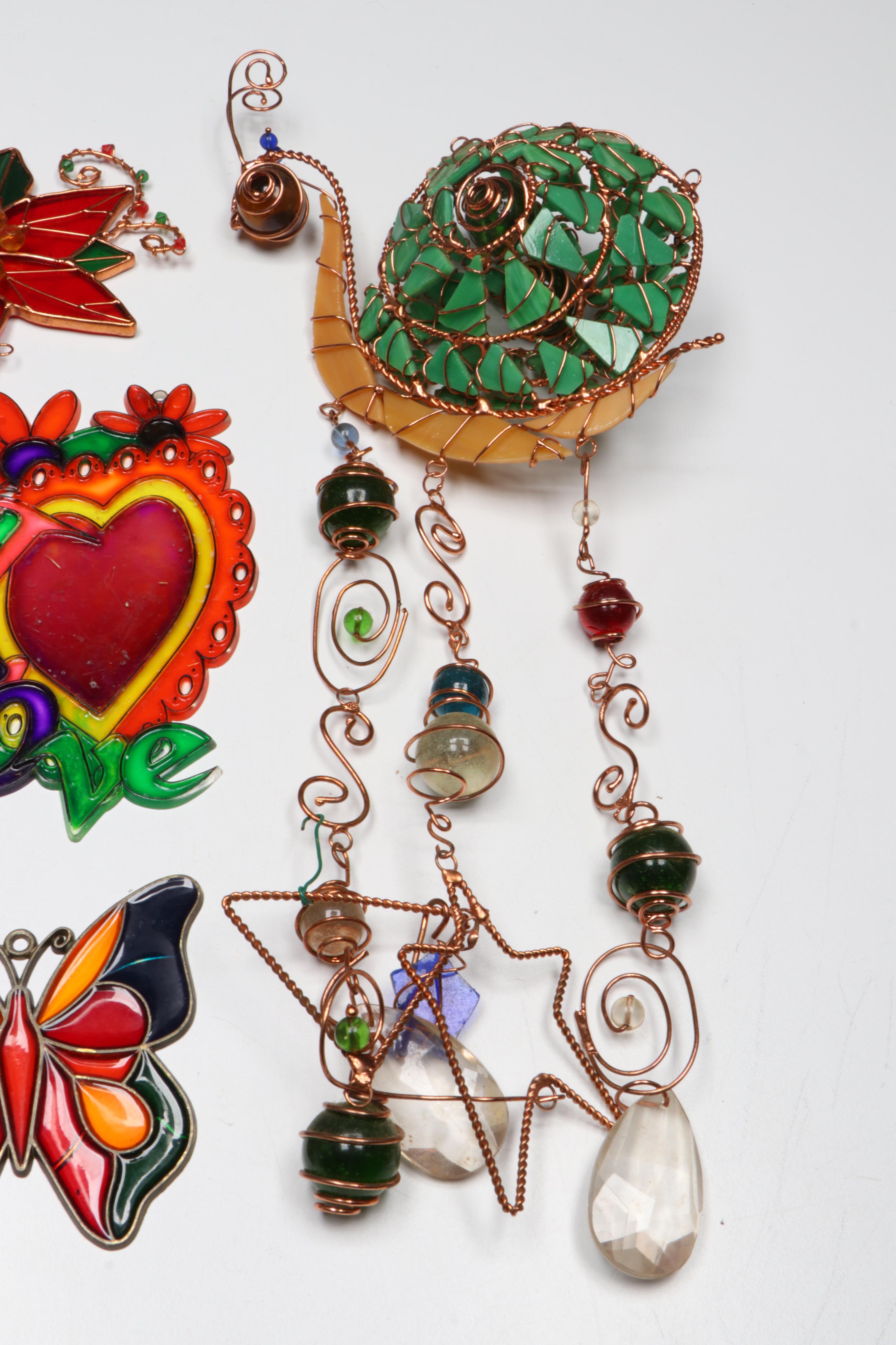 Carved Peach Pit Monkey with Glass and Wire Snail Wind Chime and Other Décor