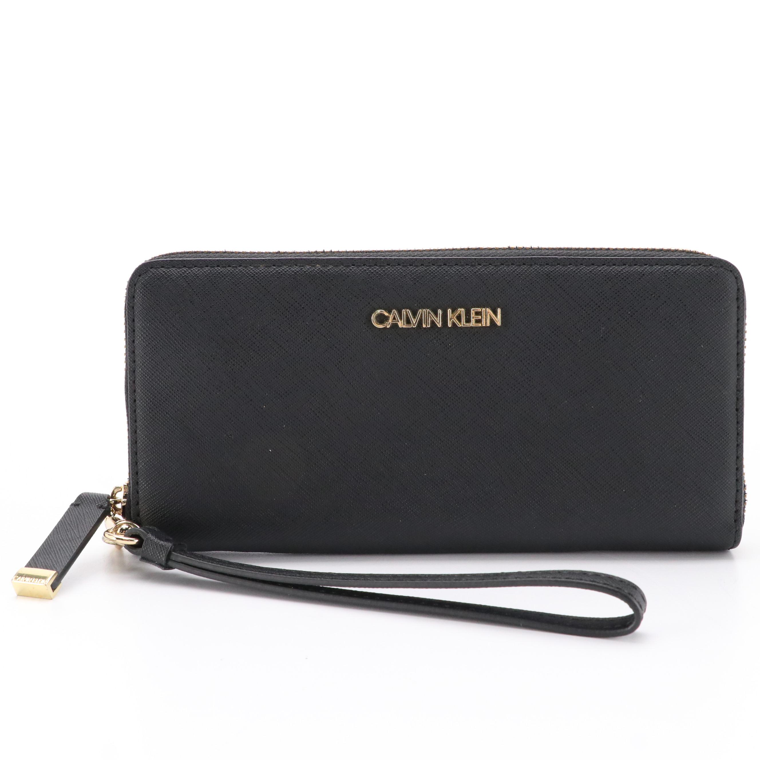 Calvin Klein Black Saffiano Leather Zip Wallet and Tory Burch Wristlet Wallet
