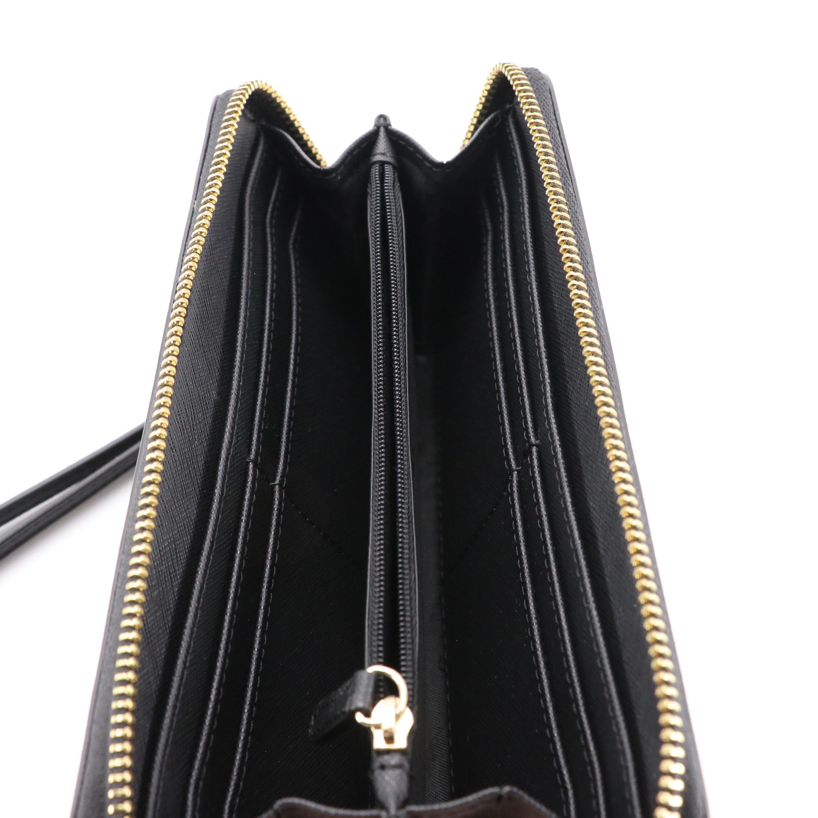 Calvin Klein Black Saffiano Leather Zip Wallet and Tory Burch Wristlet Wallet