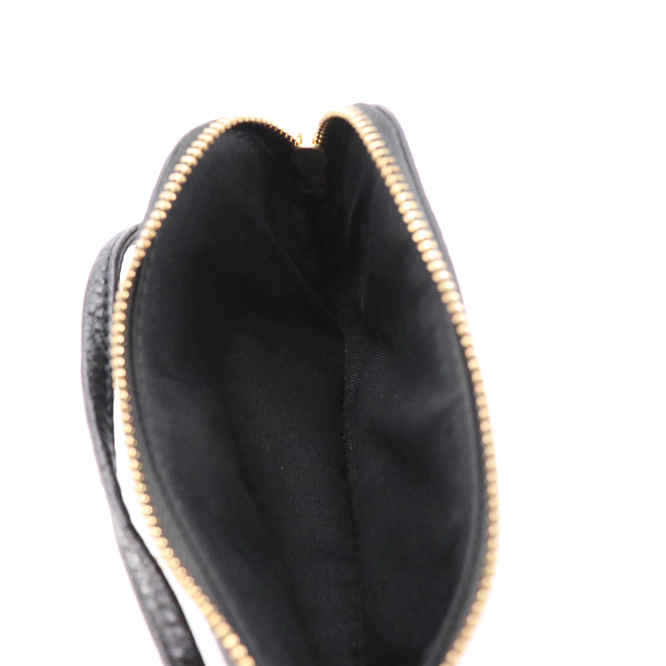 Calvin Klein Black Saffiano Leather Zip Wallet and Tory Burch Wristlet Wallet