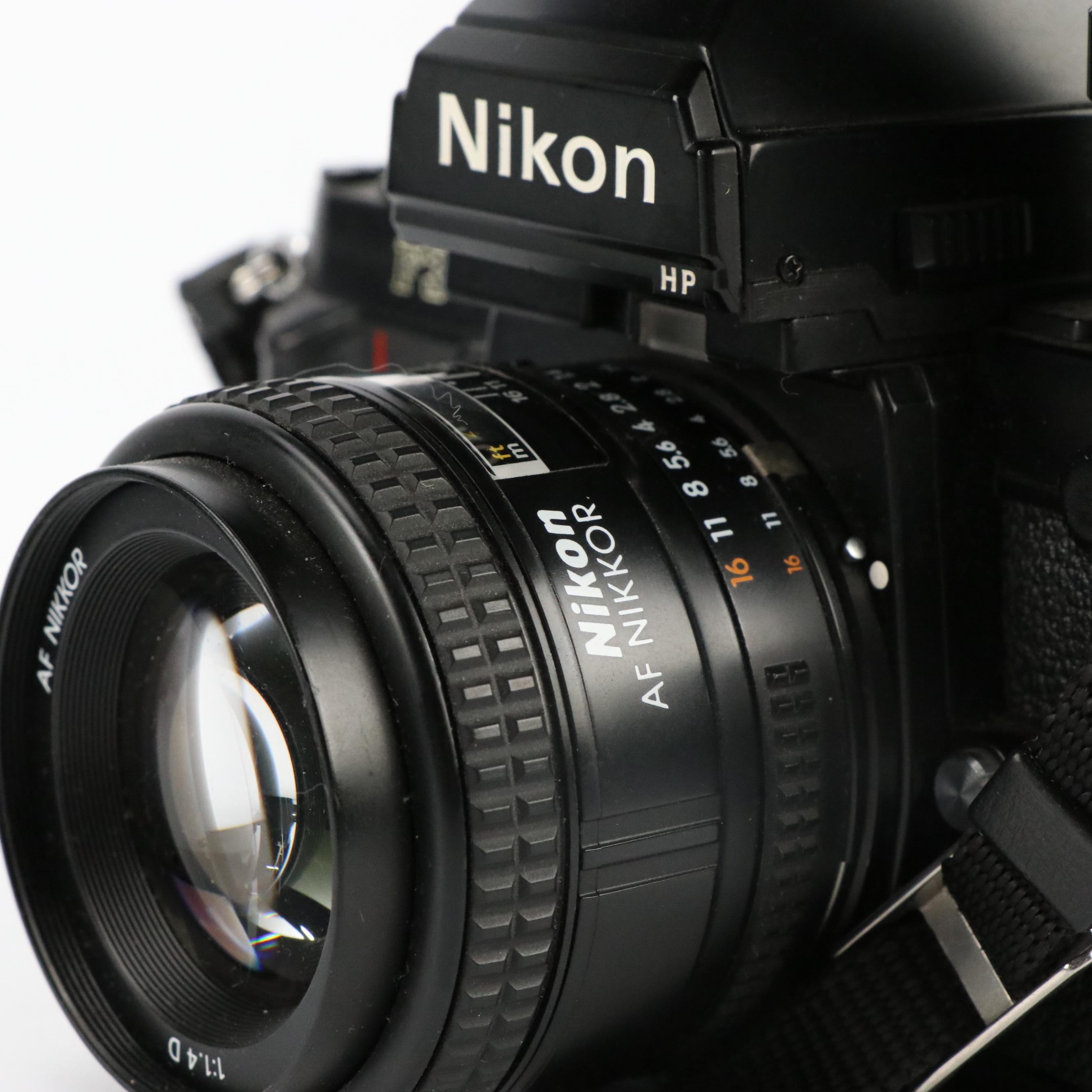 Pair of Nikon F3 with Rolleiflex SL35M 35mm Still Cameras and Nikon Speedlight