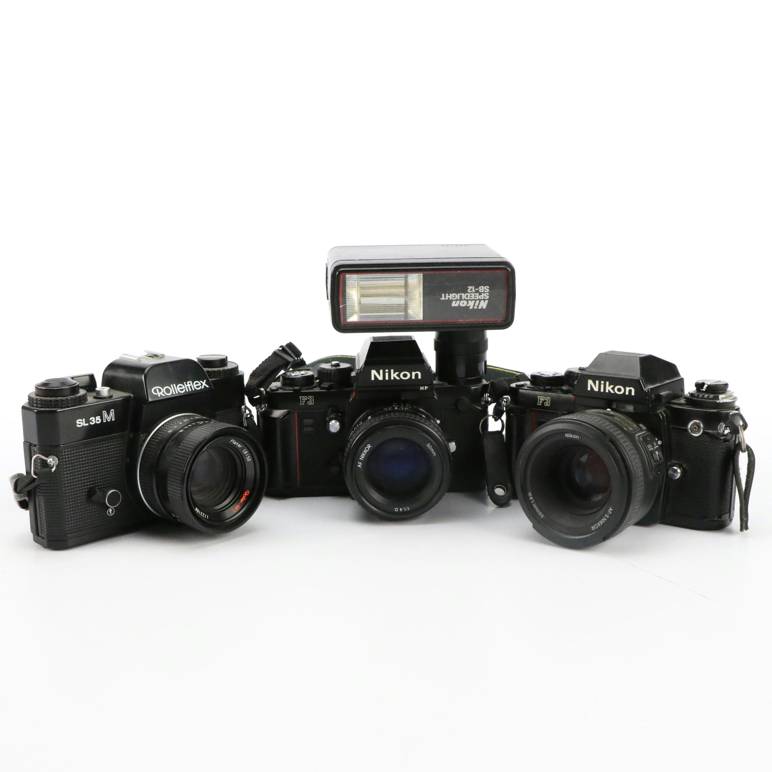 Pair of Nikon F3 with Rolleiflex SL35M 35mm Still Cameras and Nikon Speedlight