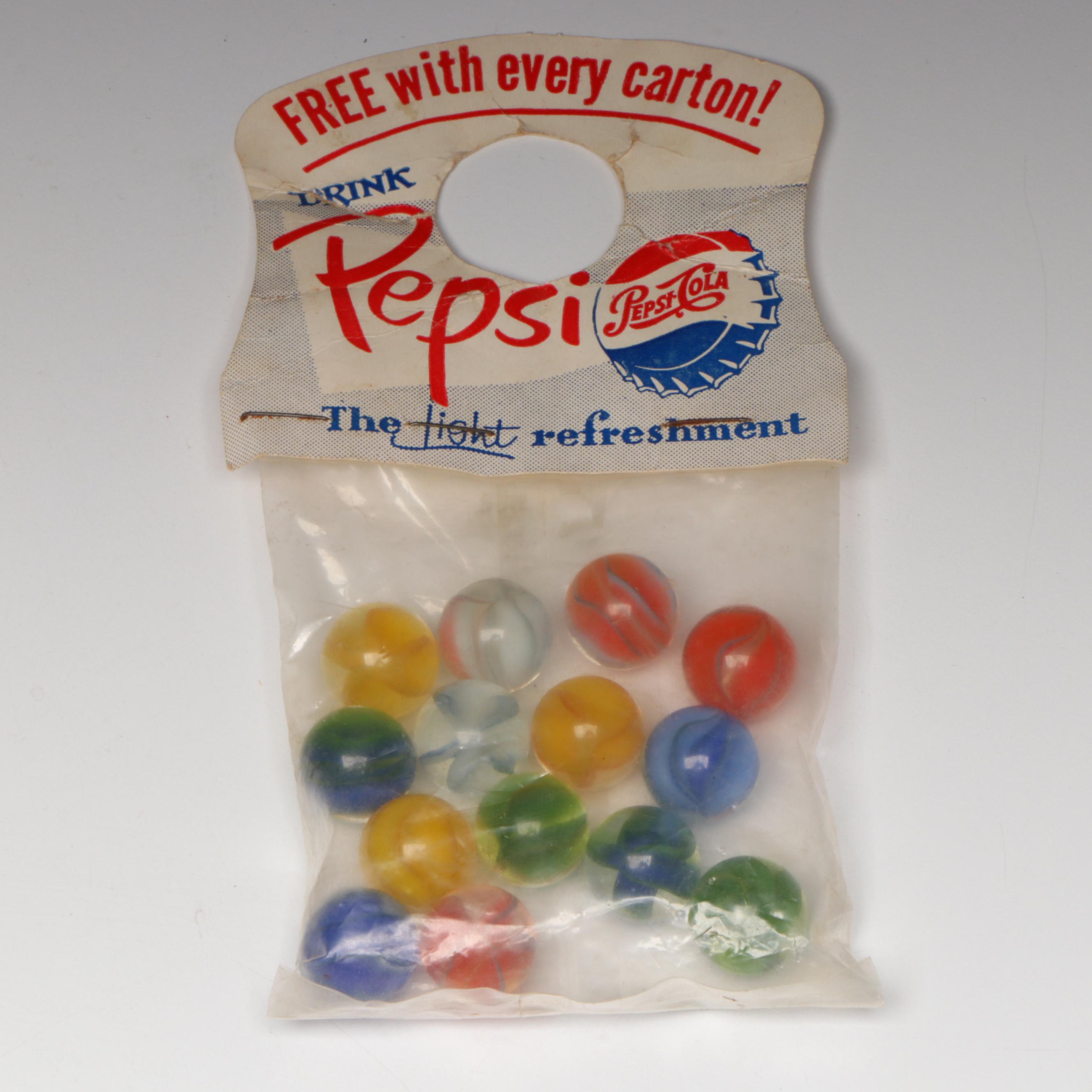 Pepsi, Nestle's Quik, Yummy and Borden's Cat's Eye Glass Marbles in Packaging