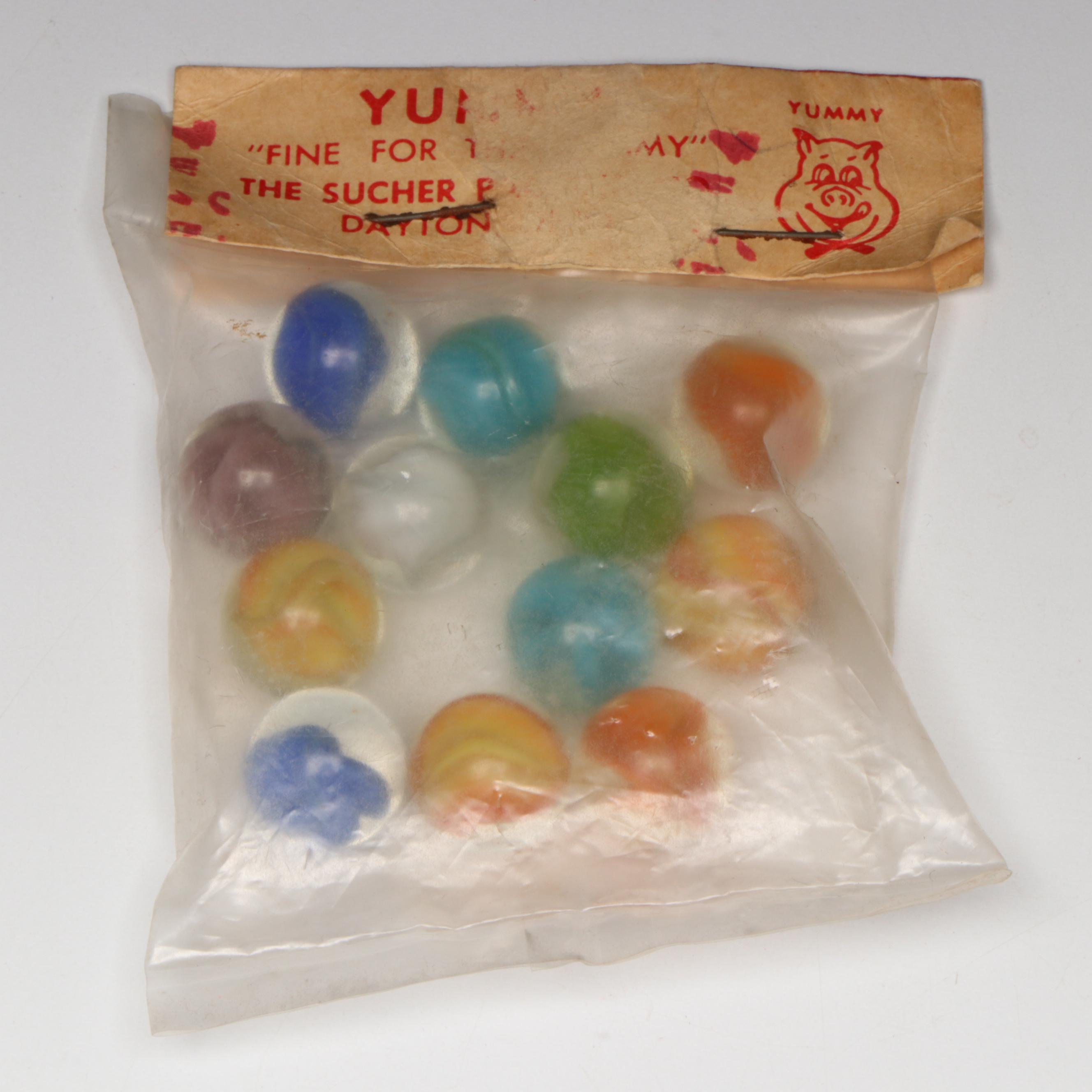 Pepsi, Nestle's Quik, Yummy and Borden's Cat's Eye Glass Marbles in Packaging