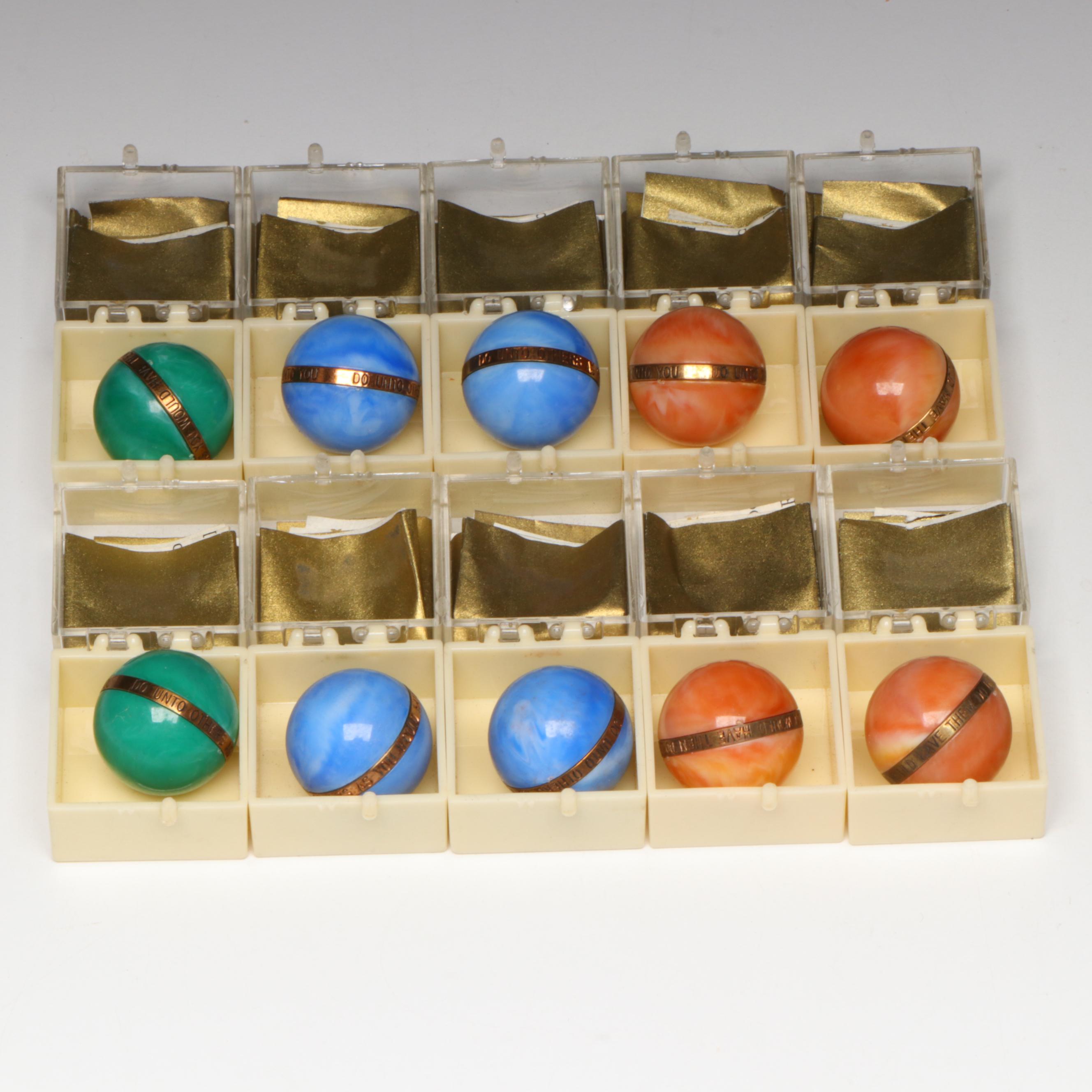 The Golden Rule Acrylic Marbles with Brass Bands, 1960s