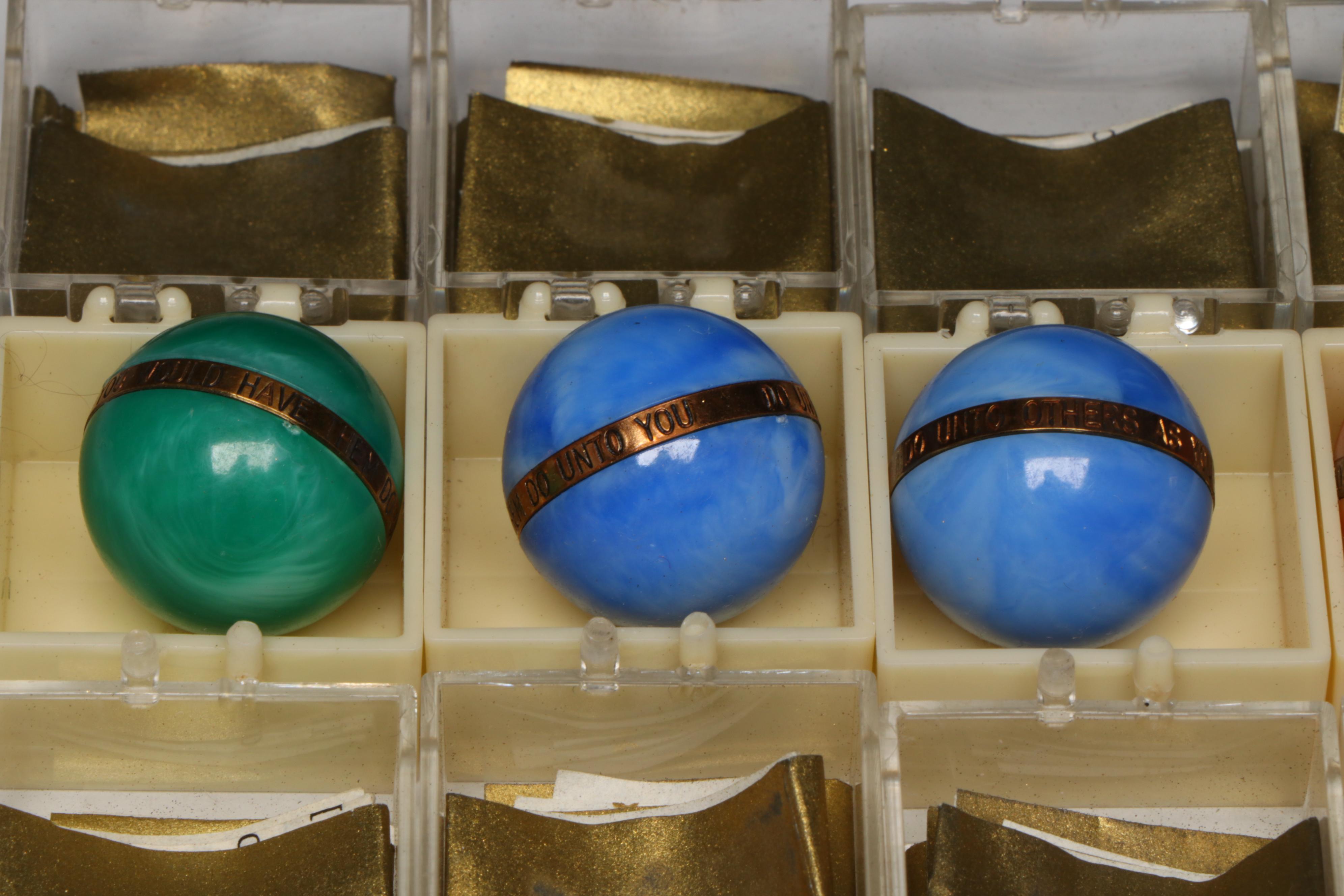The Golden Rule Acrylic Marbles with Brass Bands, 1960s