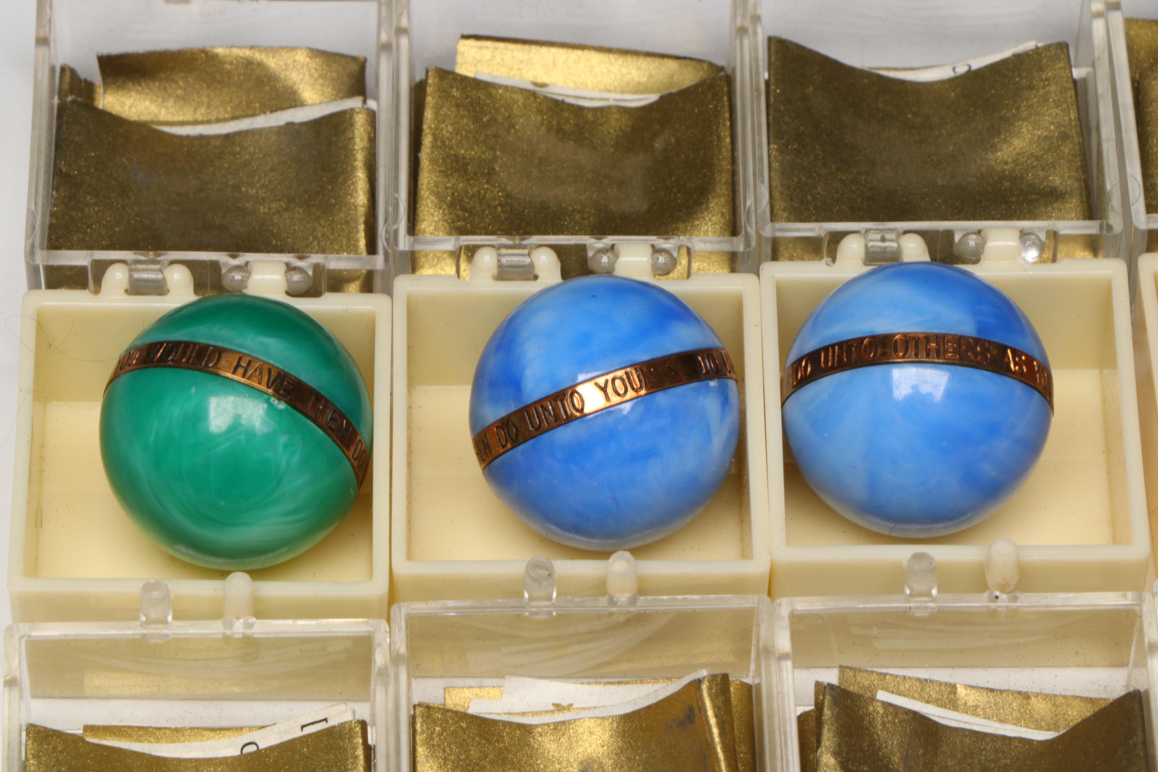 The Golden Rule Acrylic Marbles with Brass Bands, 1960s