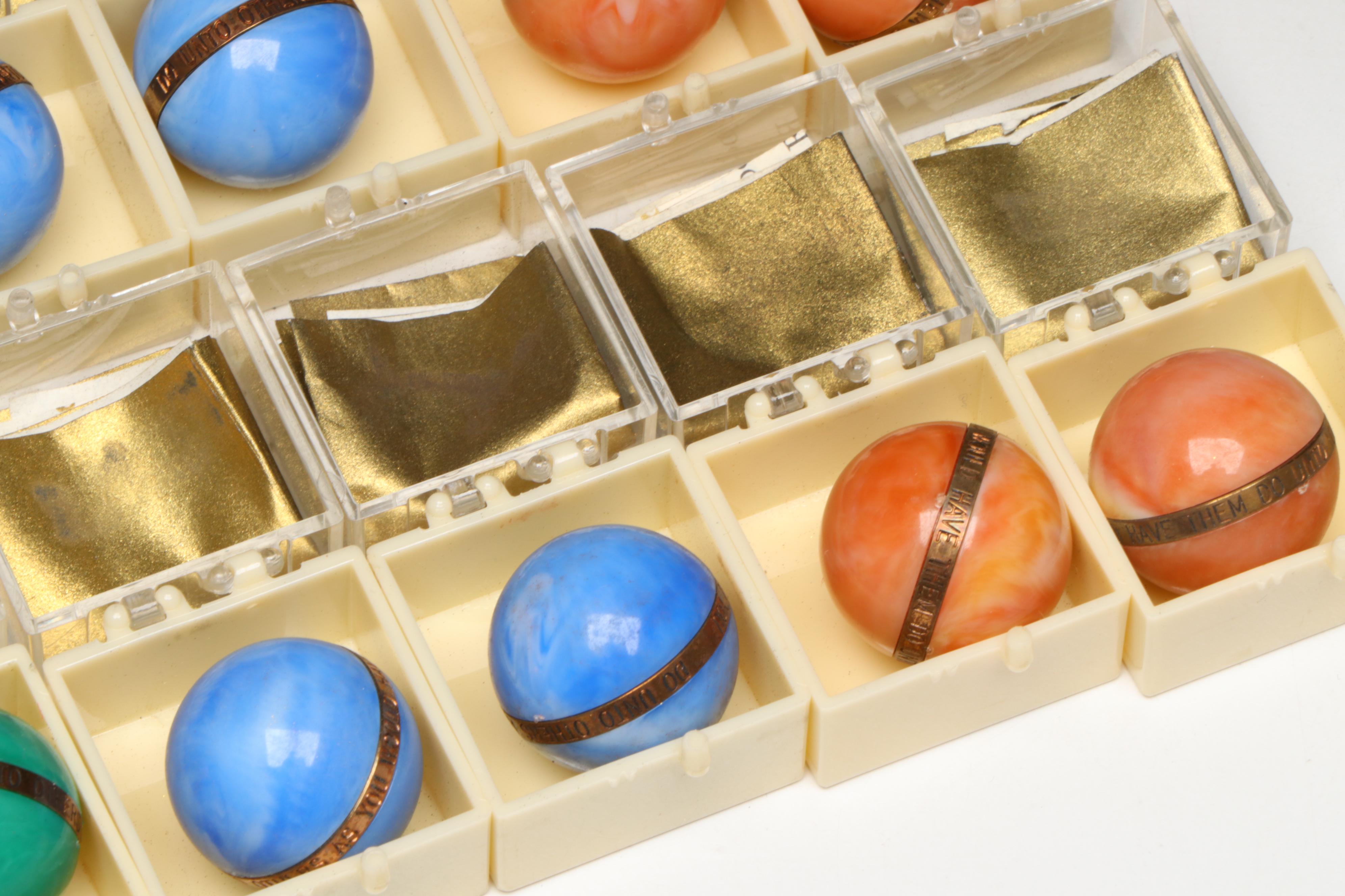 The Golden Rule Acrylic Marbles with Brass Bands, 1960s