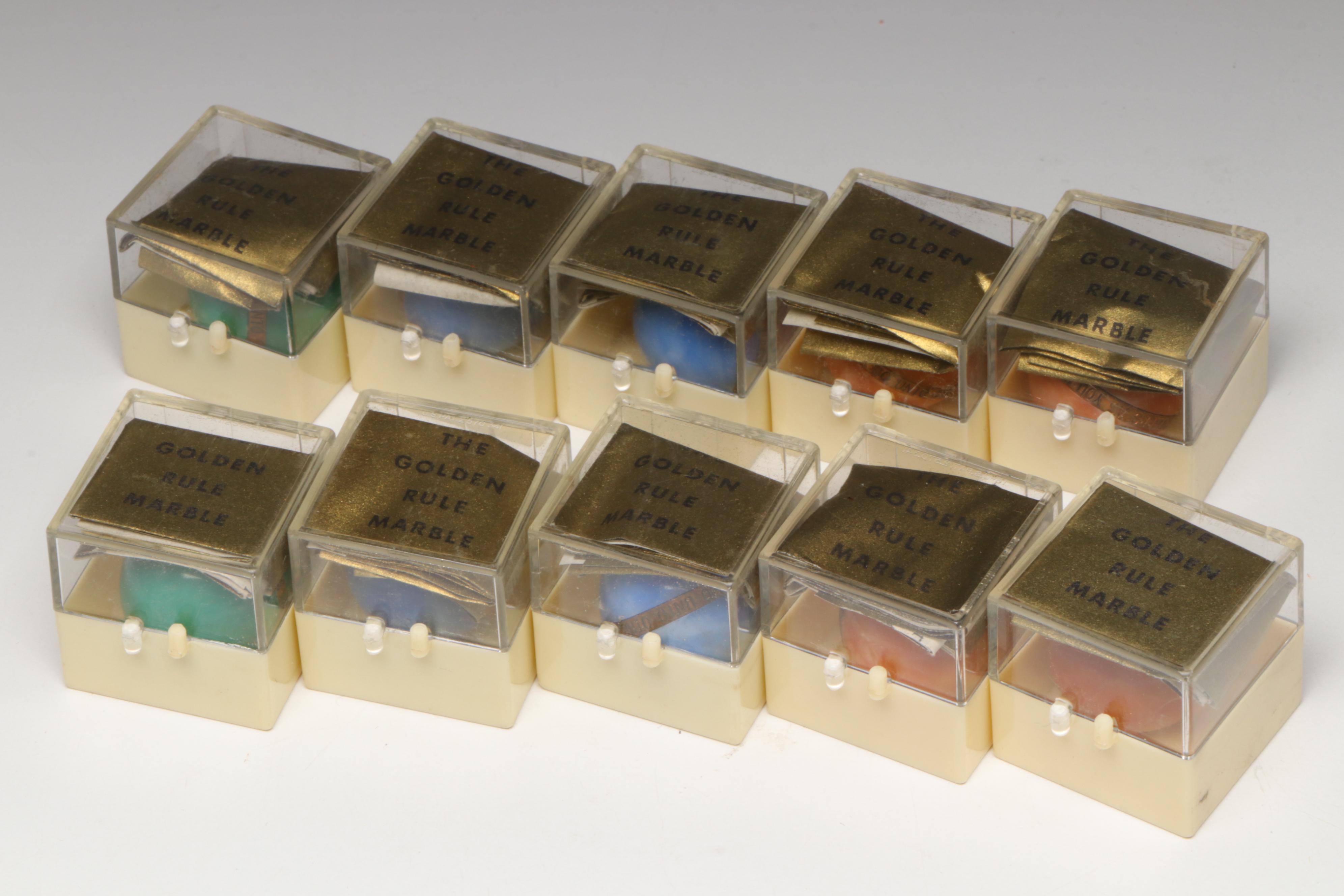 The Golden Rule Acrylic Marbles with Brass Bands, 1960s