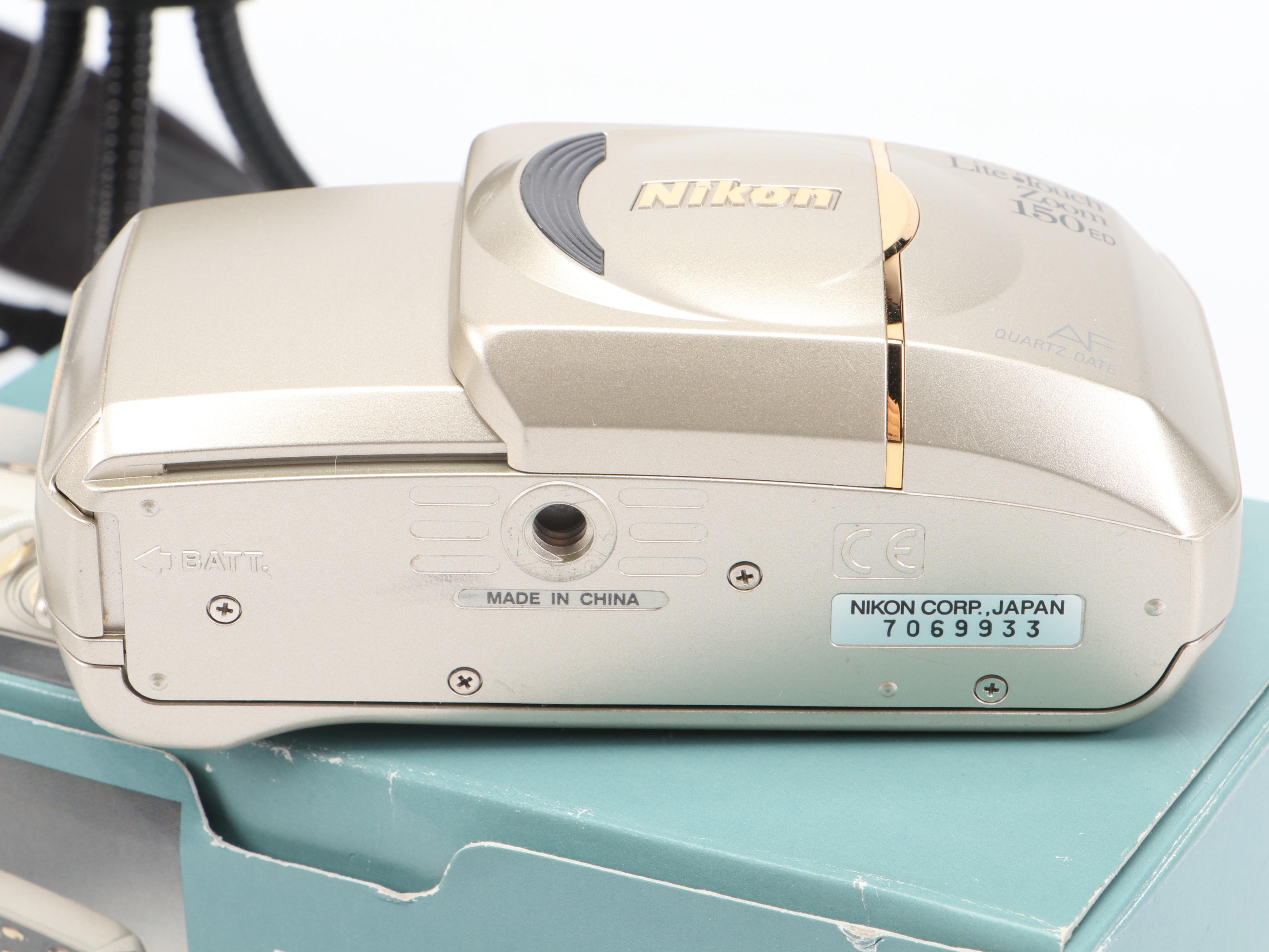 Canon PowerShot S70 and Nikon Life-Touch Zoom 150 ED with Cards and Bag