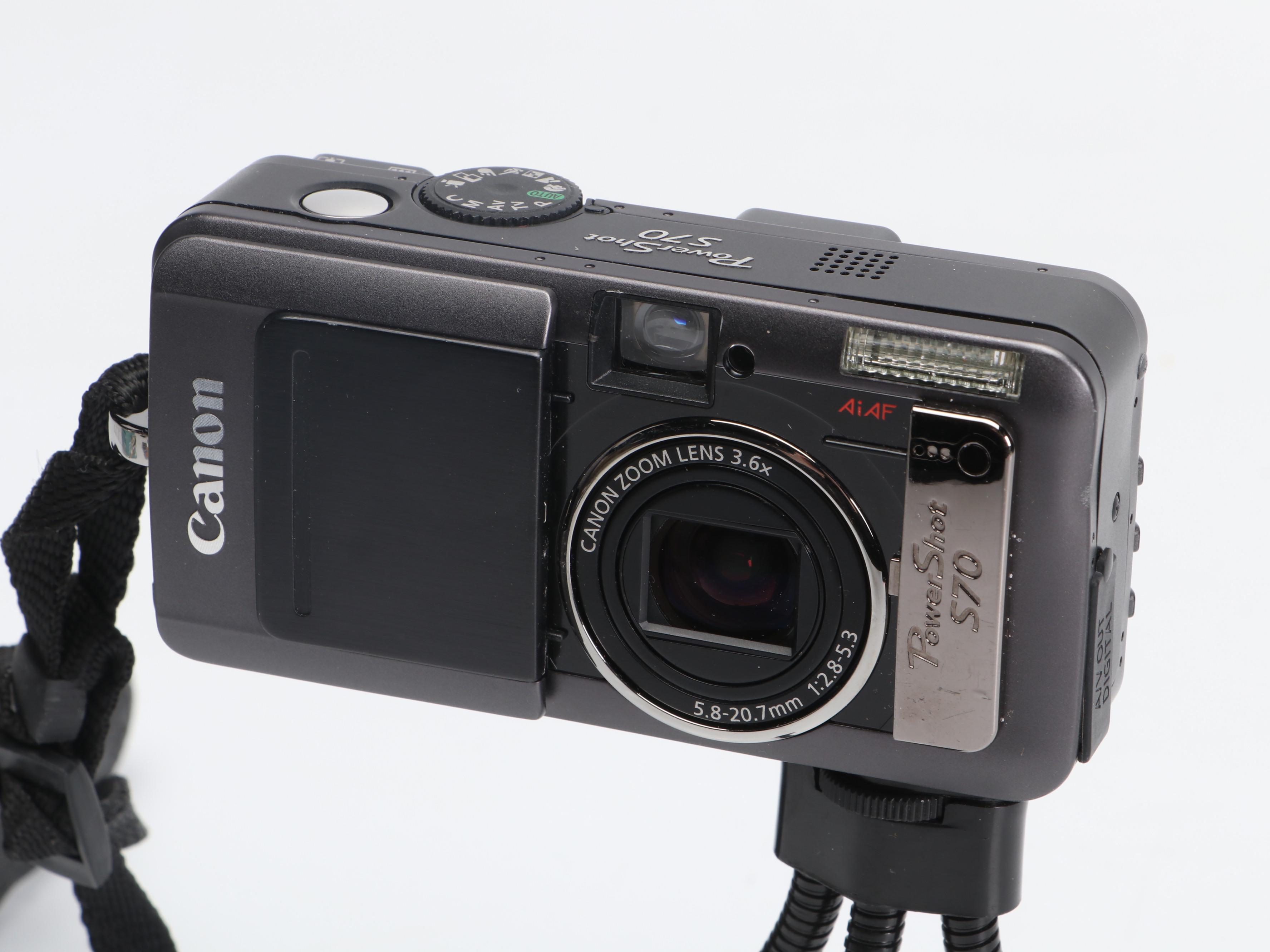 Canon PowerShot S70 and Nikon Life-Touch Zoom 150 ED with Cards and Bag