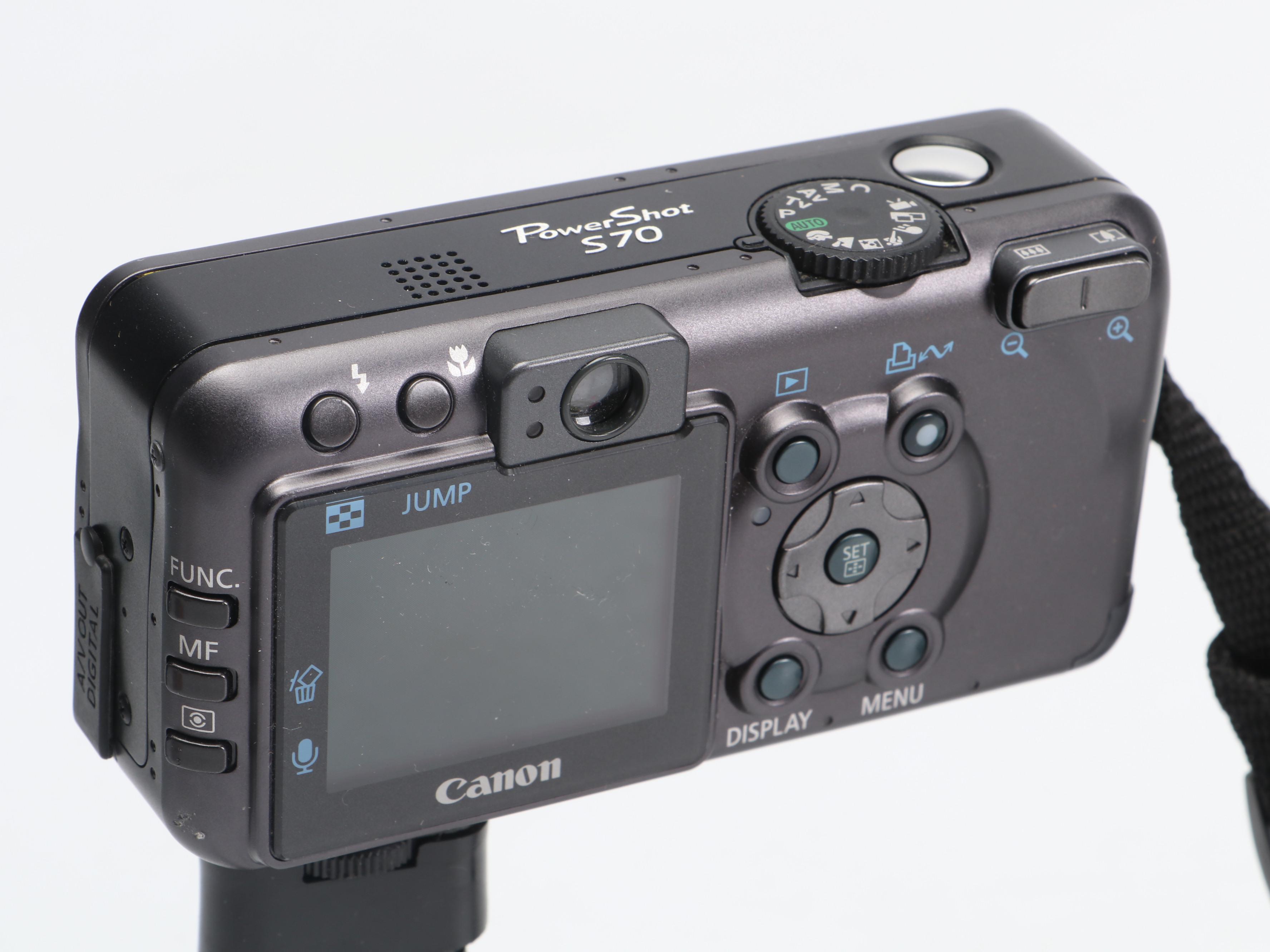 Canon PowerShot S70 and Nikon Life-Touch Zoom 150 ED with Cards and Bag