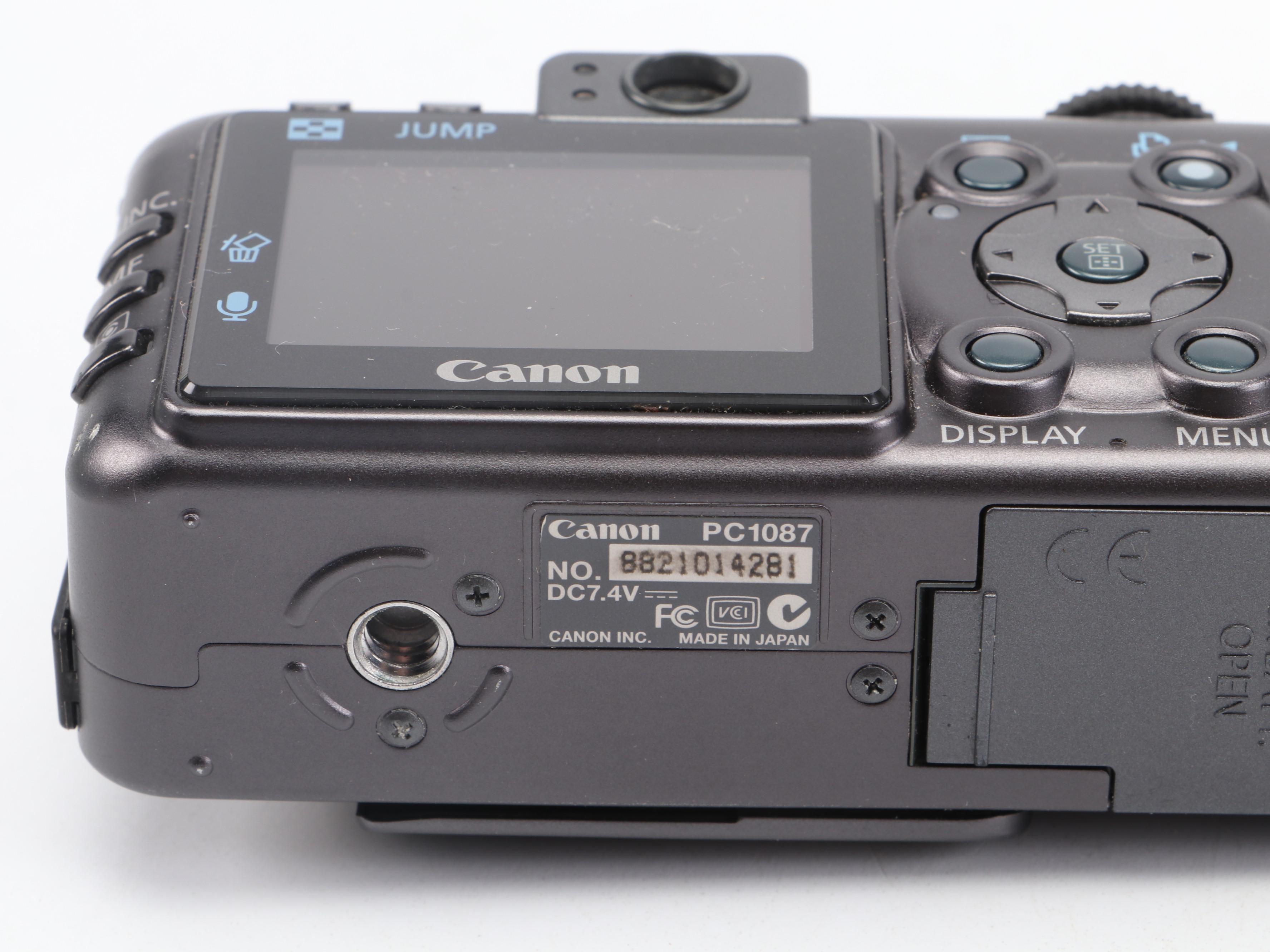 Canon PowerShot S70 and Nikon Life-Touch Zoom 150 ED with Cards and Bag