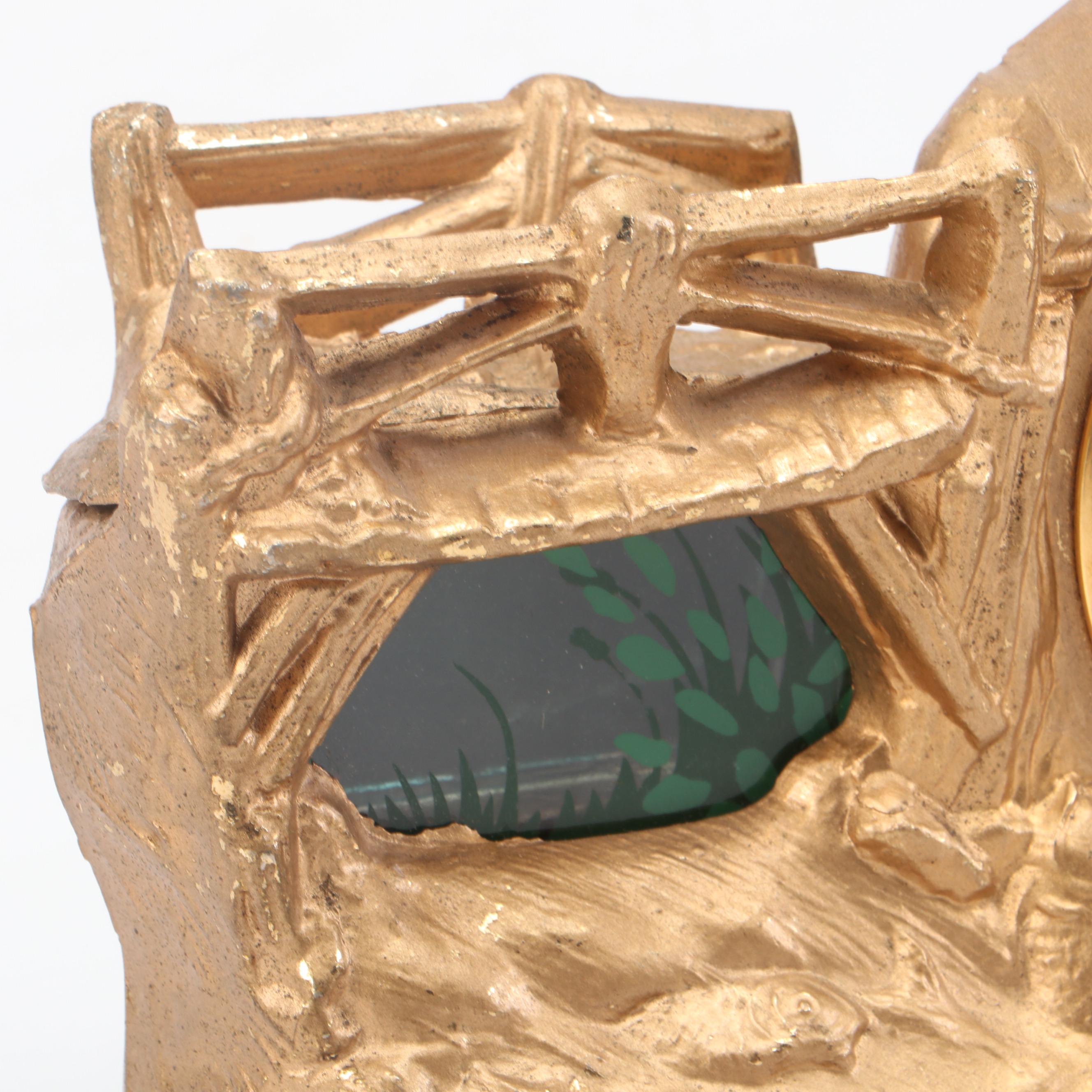 United Clock Corp. Gilt Metal Fishing Boy Mantel Clock, Mid-20th C.