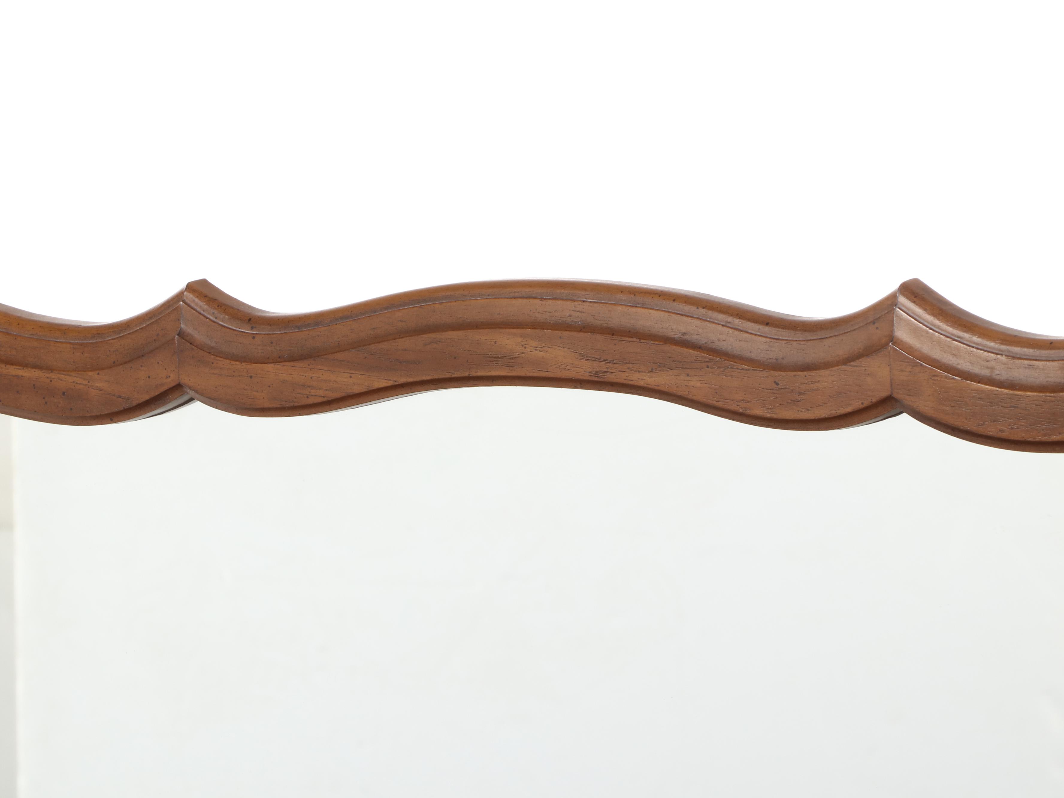 French Provincial Style Fruitwood-Stained Nine-Drawer Serpentine Dresser