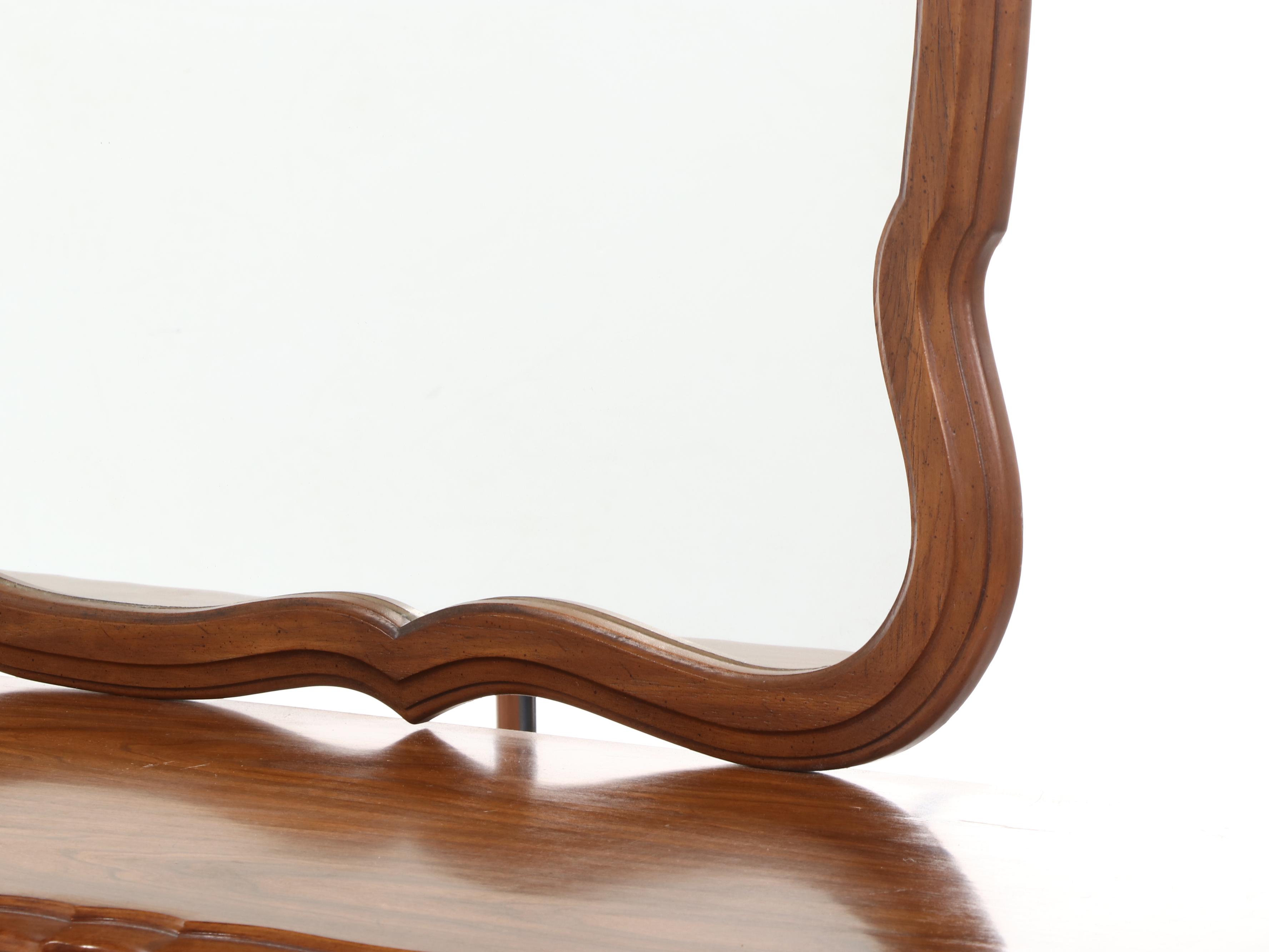 French Provincial Style Fruitwood-Stained Nine-Drawer Serpentine Dresser