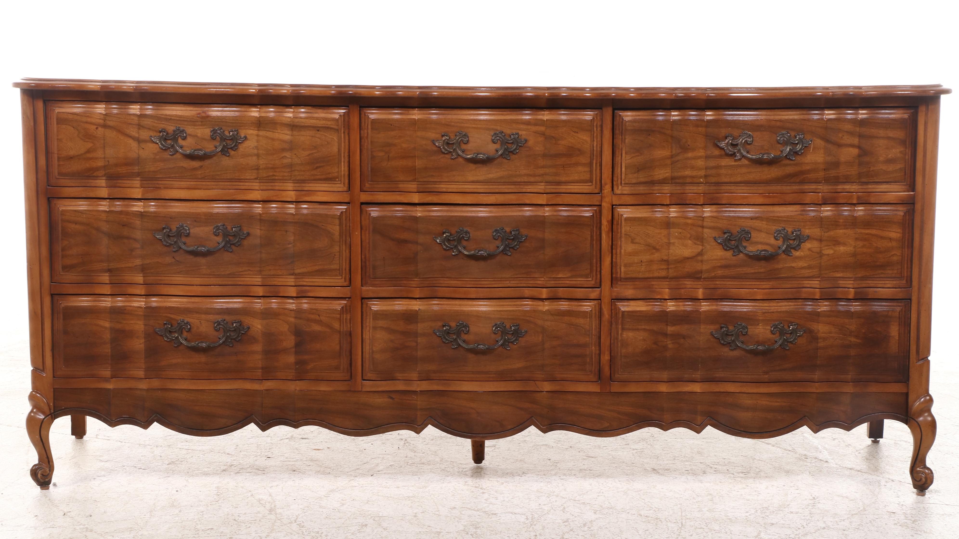 French Provincial Style Fruitwood-Stained Nine-Drawer Serpentine Dresser