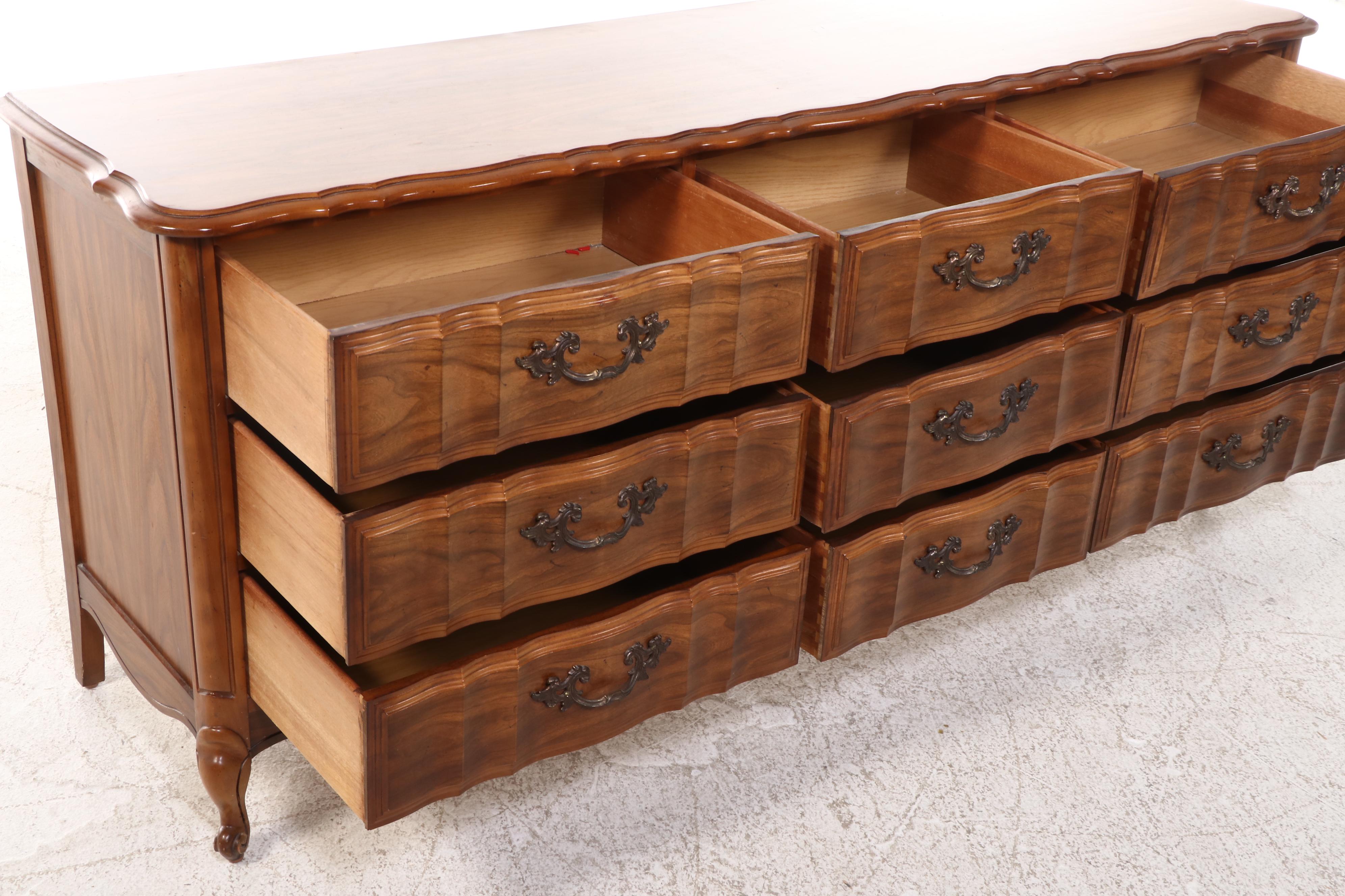 French Provincial Style Fruitwood-Stained Nine-Drawer Serpentine Dresser