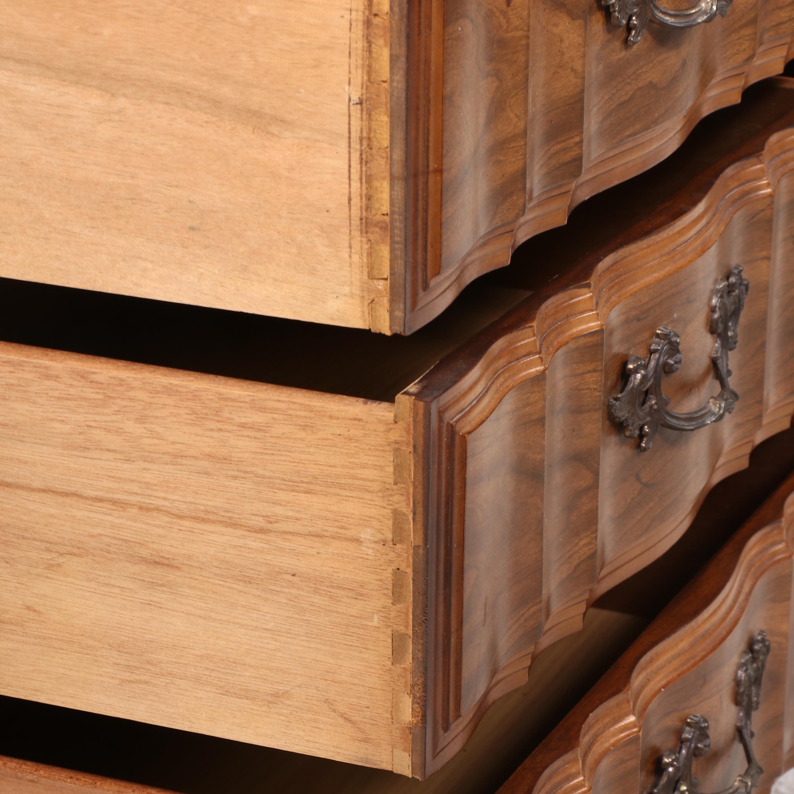 French Provincial Style Fruitwood-Stained Nine-Drawer Serpentine Dresser