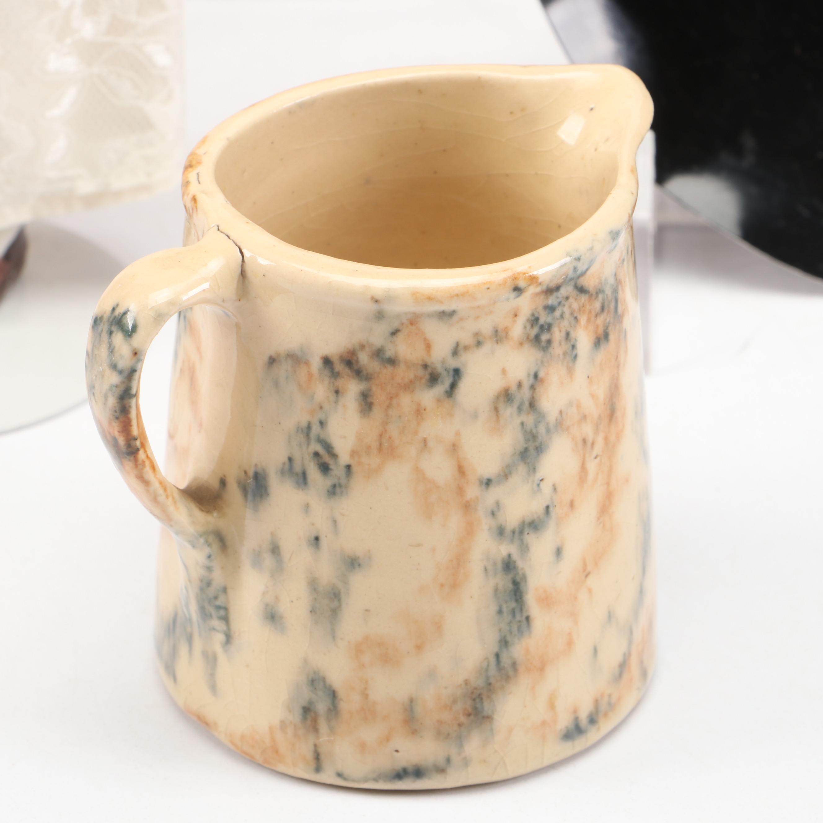 Spongeware Pitcher with China Doll and Other Décor