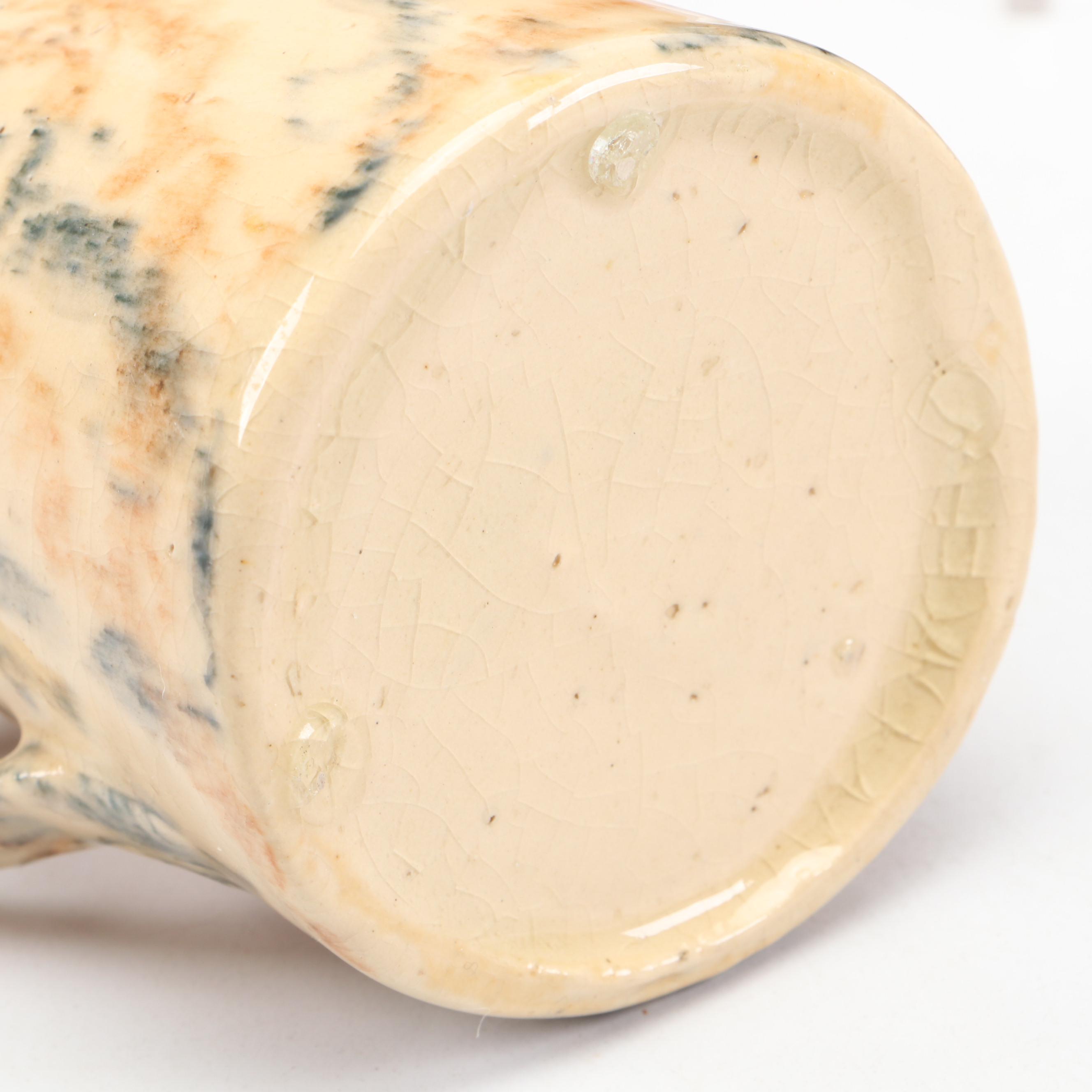 Spongeware Pitcher with China Doll and Other Décor