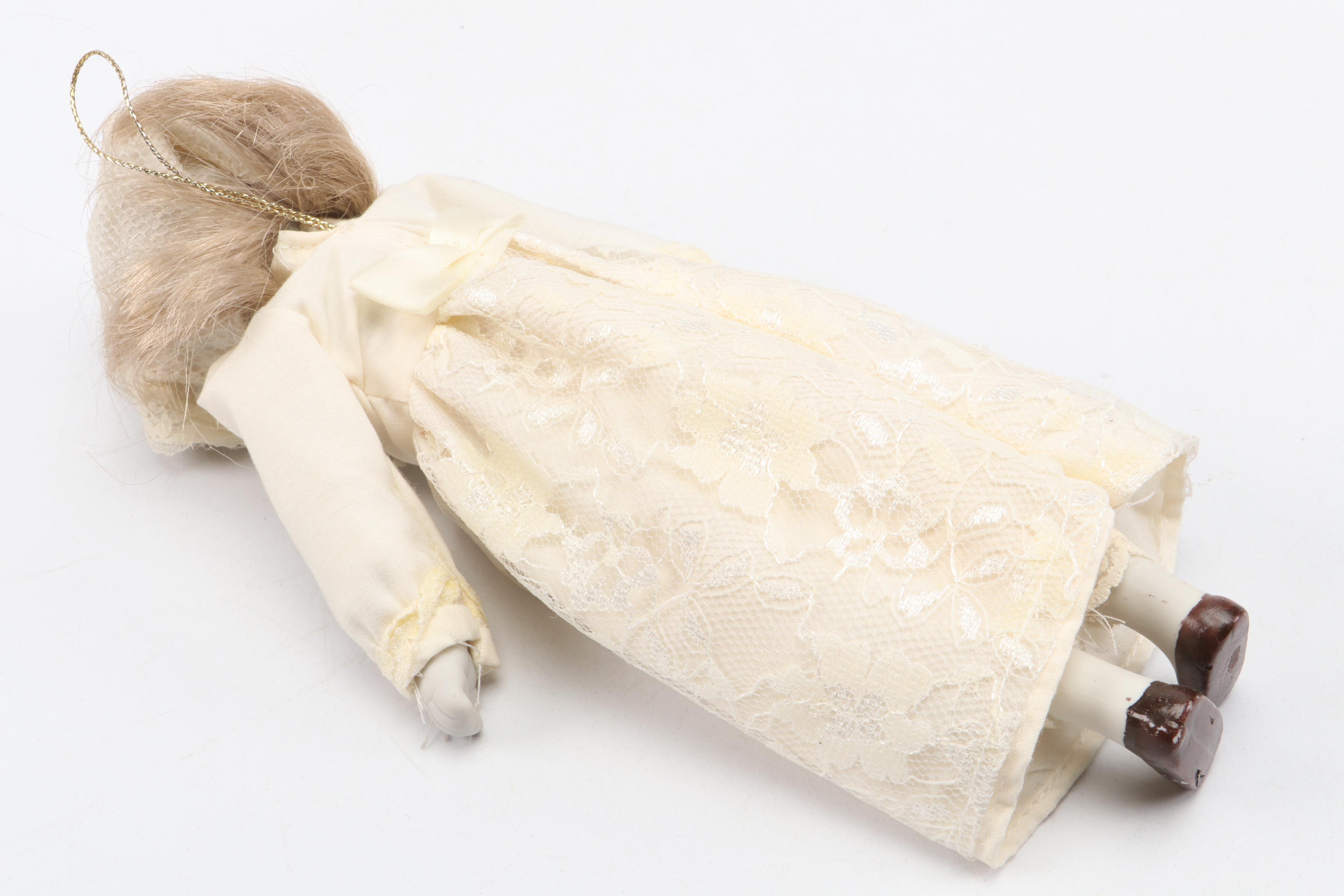 Spongeware Pitcher with China Doll and Other Décor