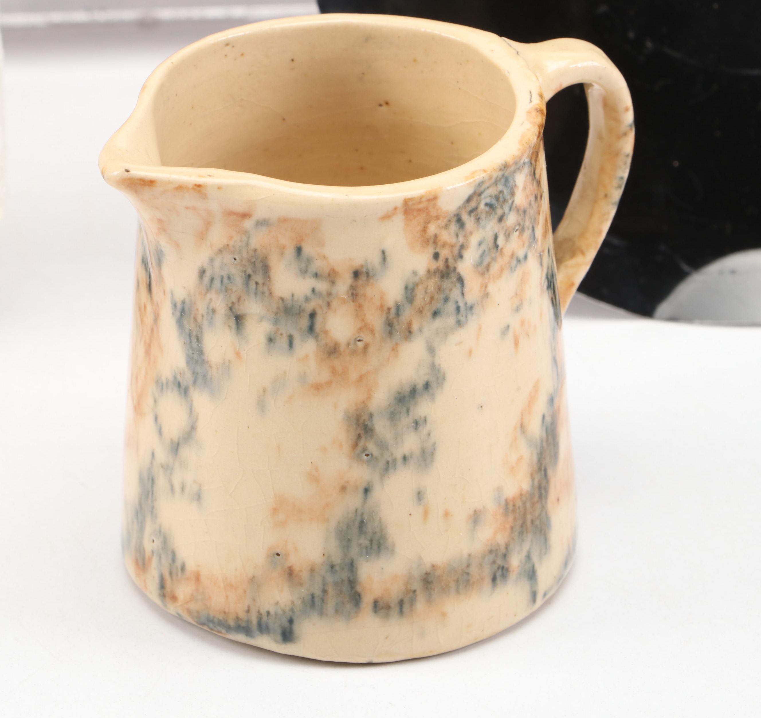 Spongeware Pitcher with China Doll and Other Décor