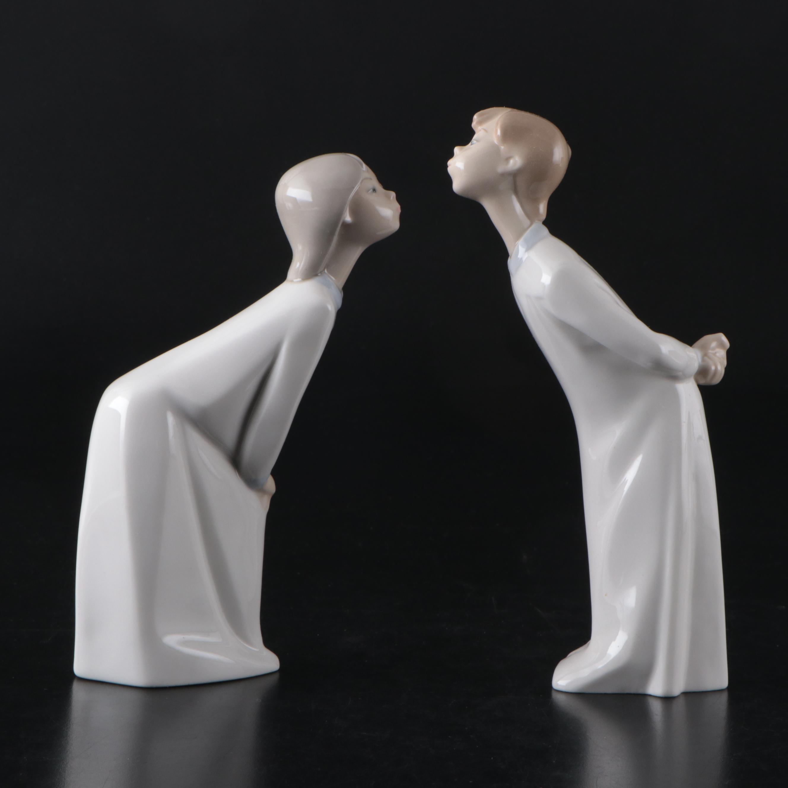 Lladró Kissing Girl and Boy Porcelain Figurines, Designed by Fulgencio Garcia